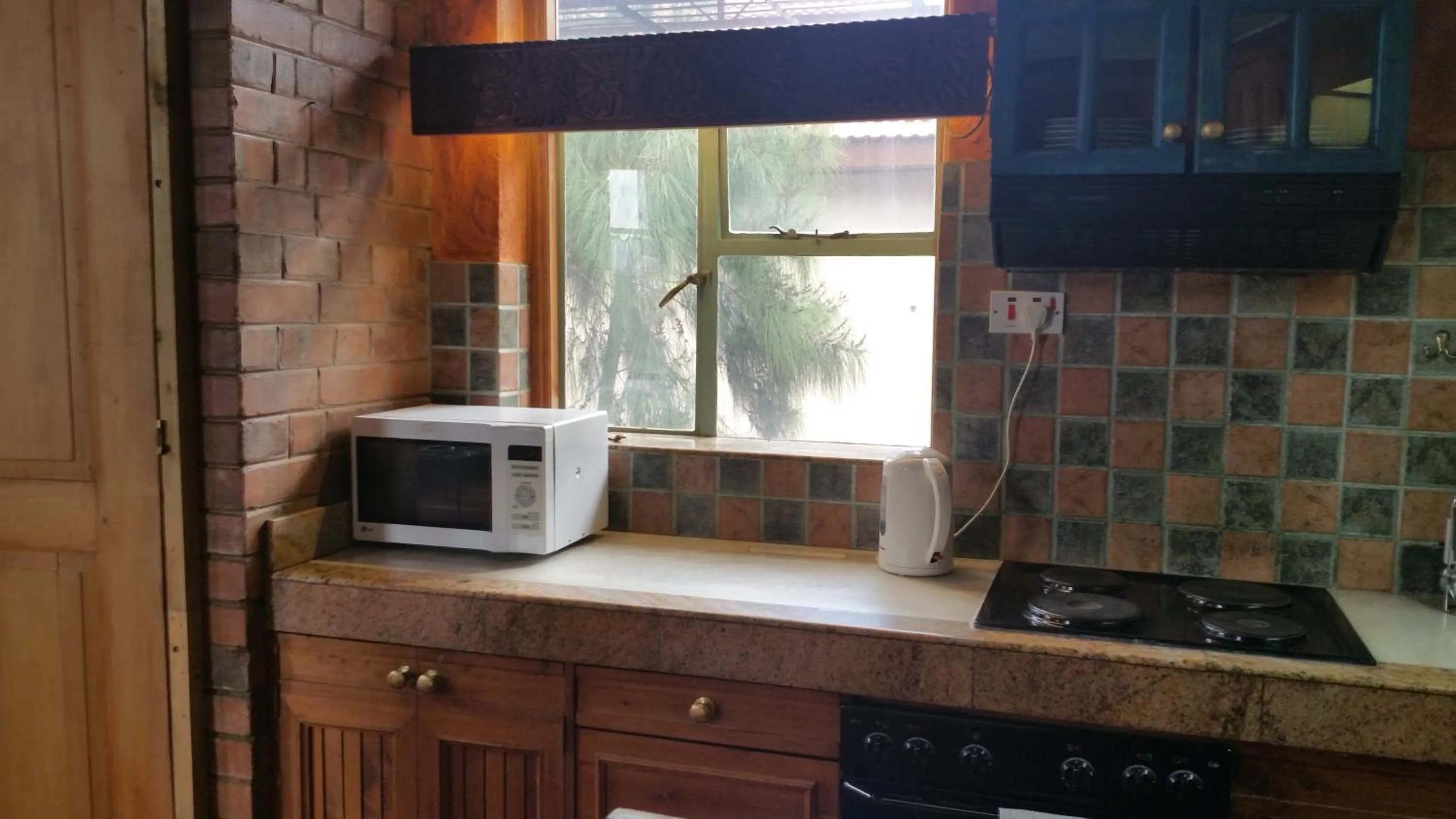 Kitchen or kitchenette in Woodmere Grand Hotel & Serviced Apartments