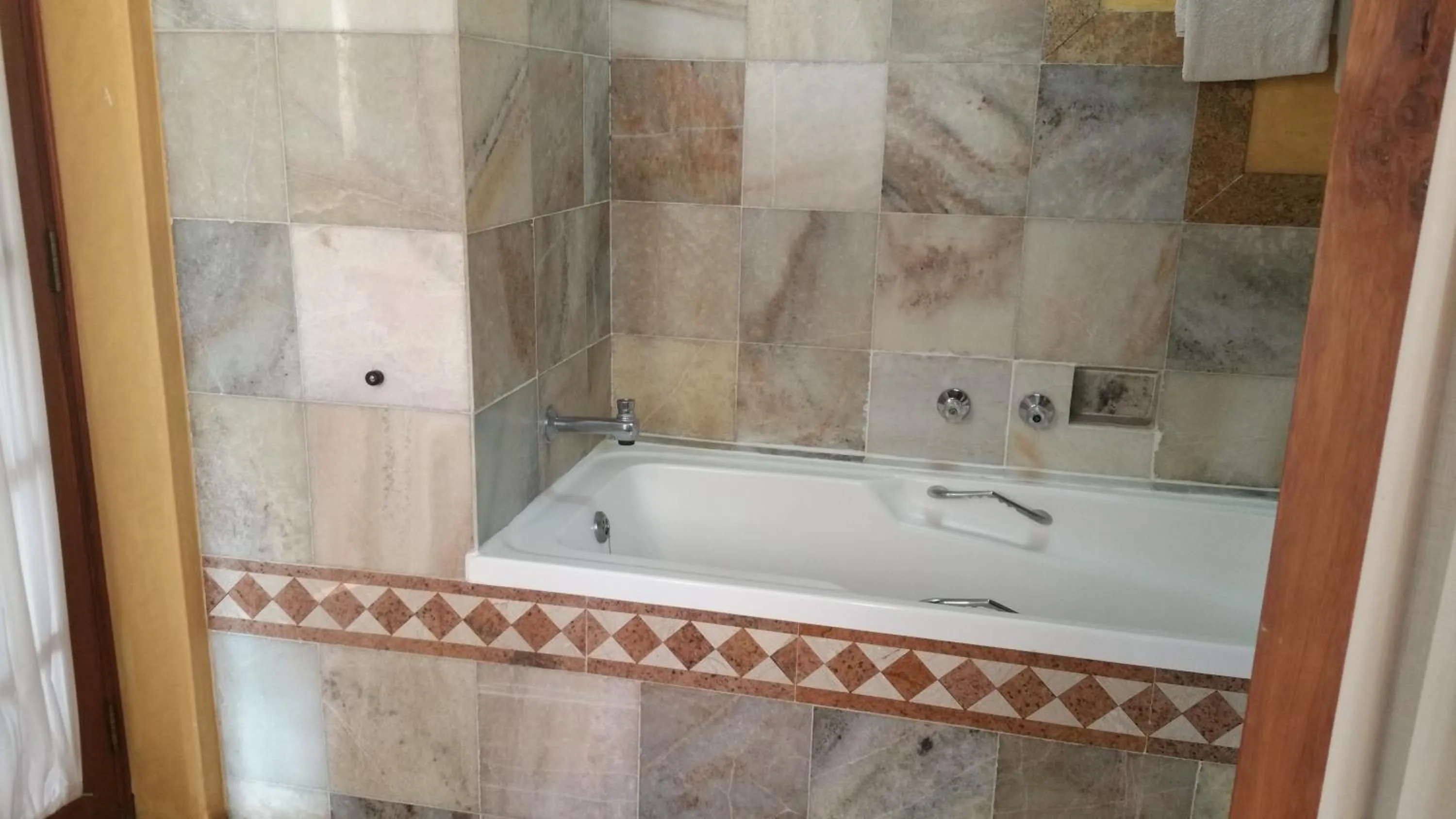 Bathroom in Woodmere Grand Hotel & Serviced Apartments