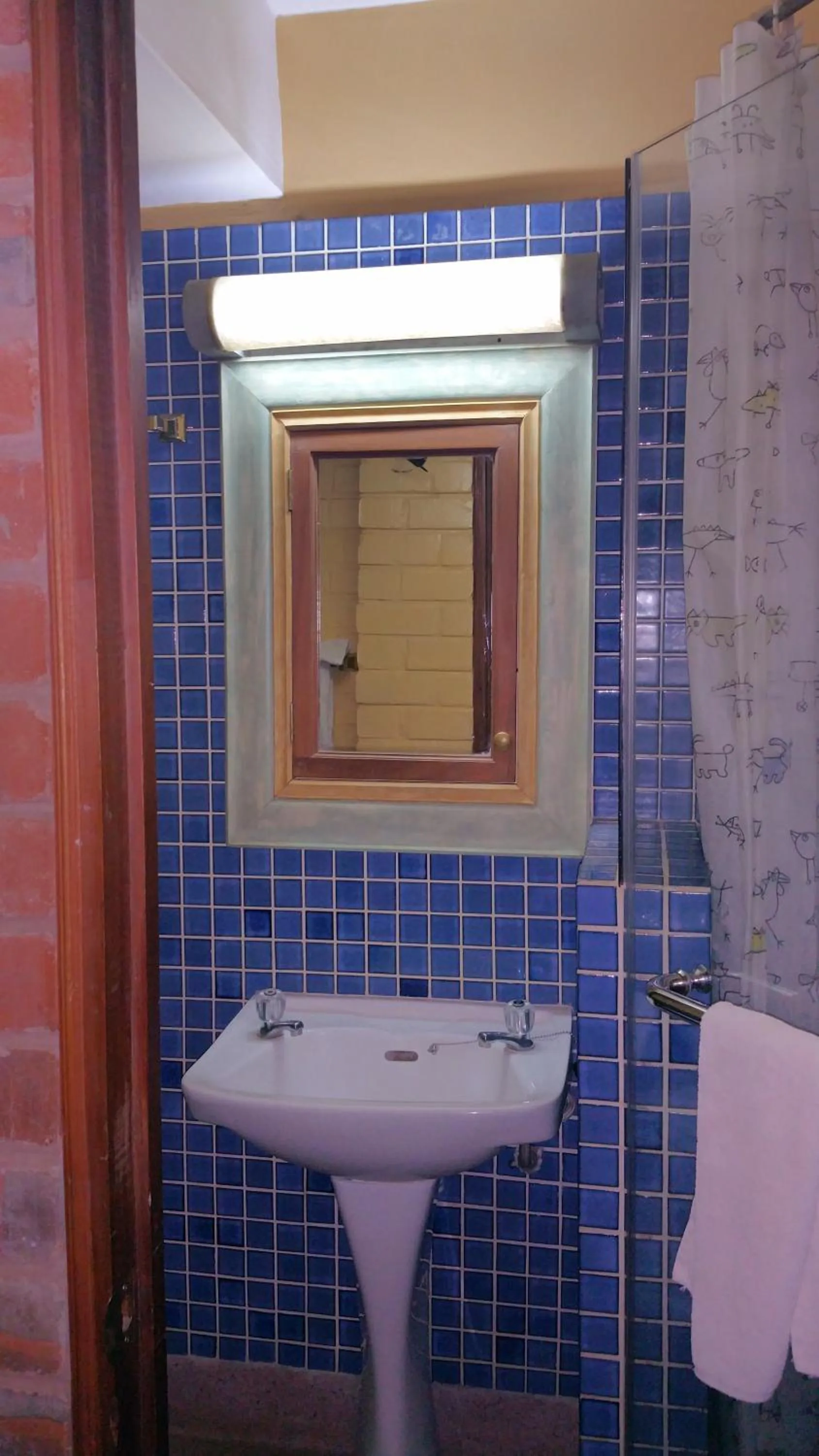 Bathroom in Woodmere Grand Hotel & Serviced Apartments