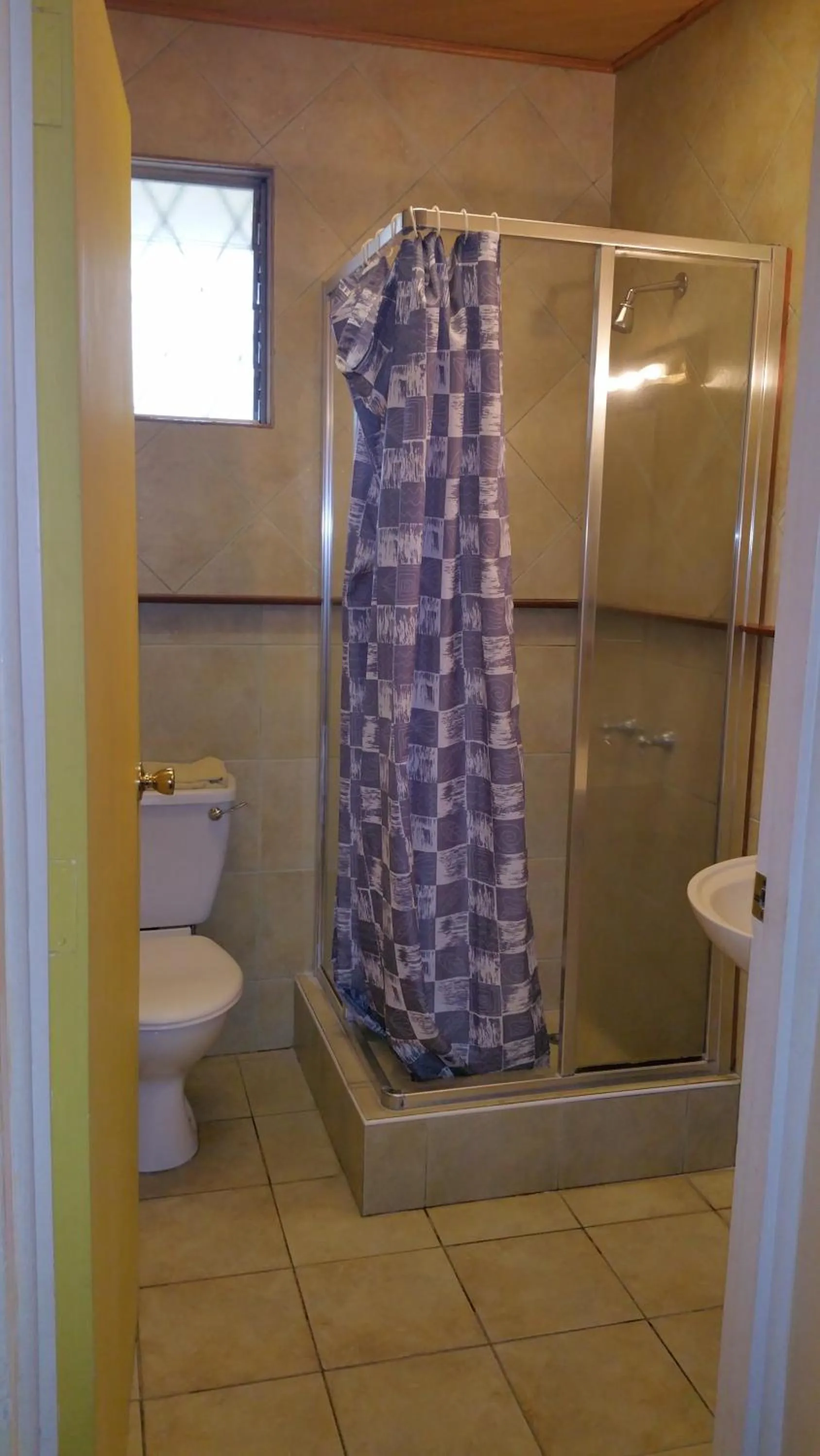 Bathroom in Woodmere Grand Hotel & Serviced Apartments