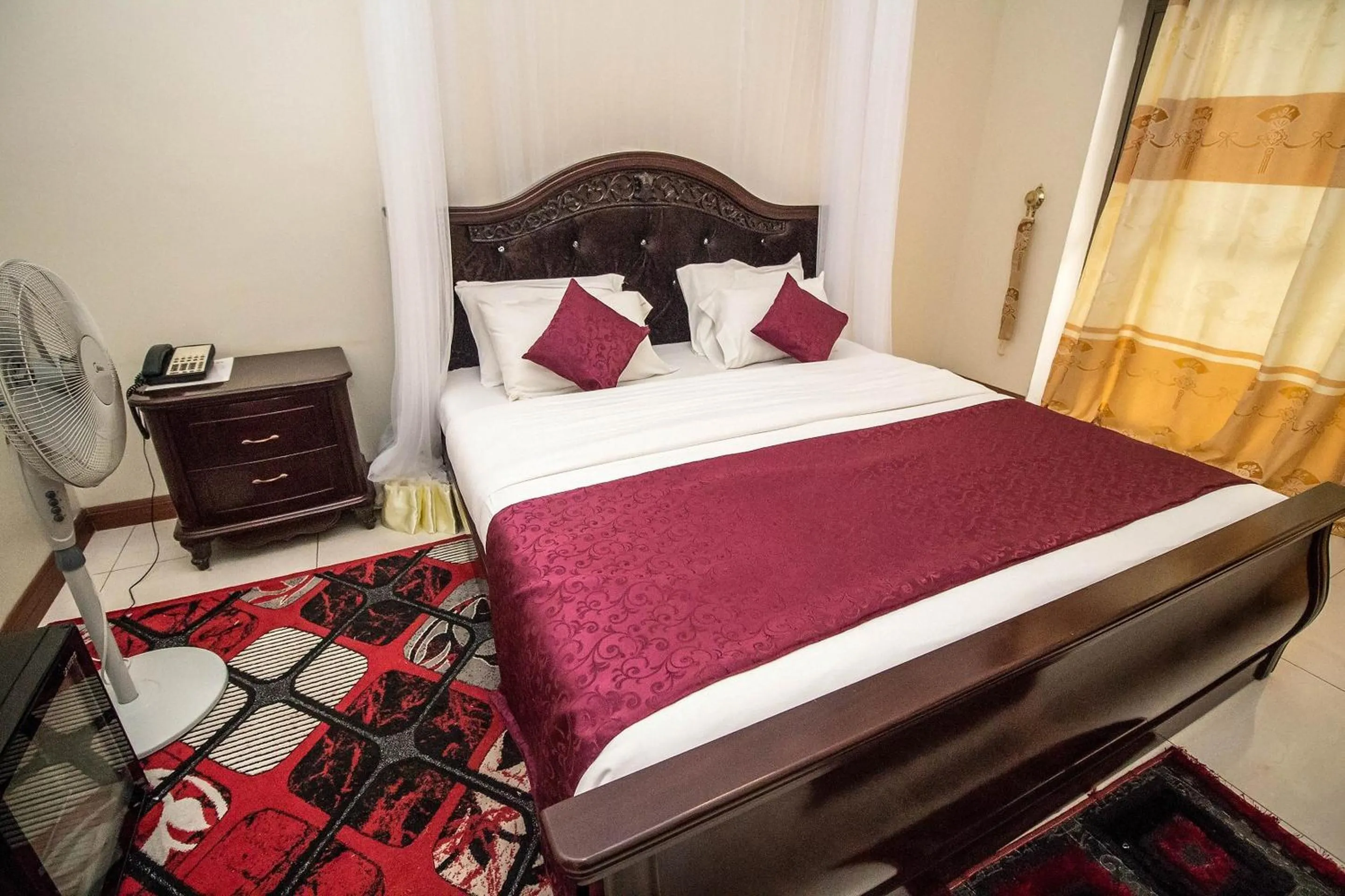 Bed in Sir Jose Hotel