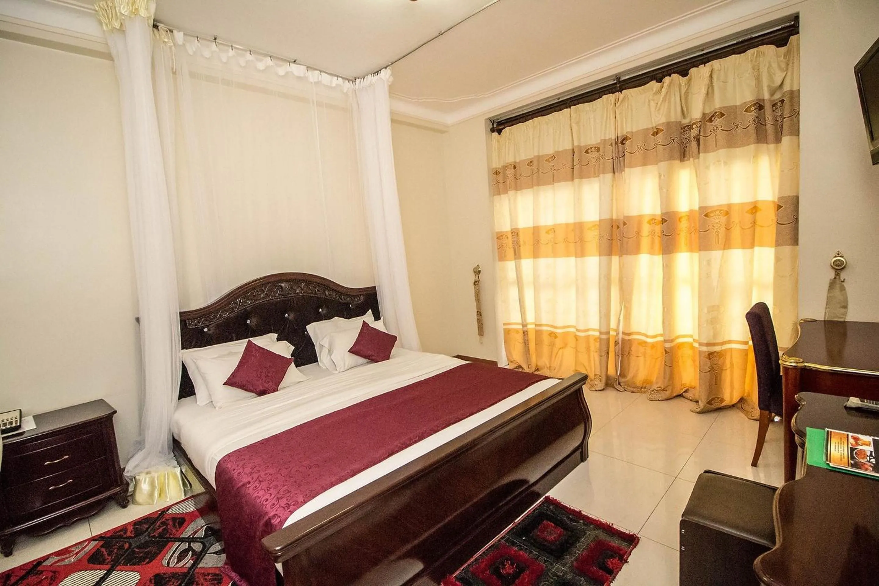 Bed in Sir Jose Hotel