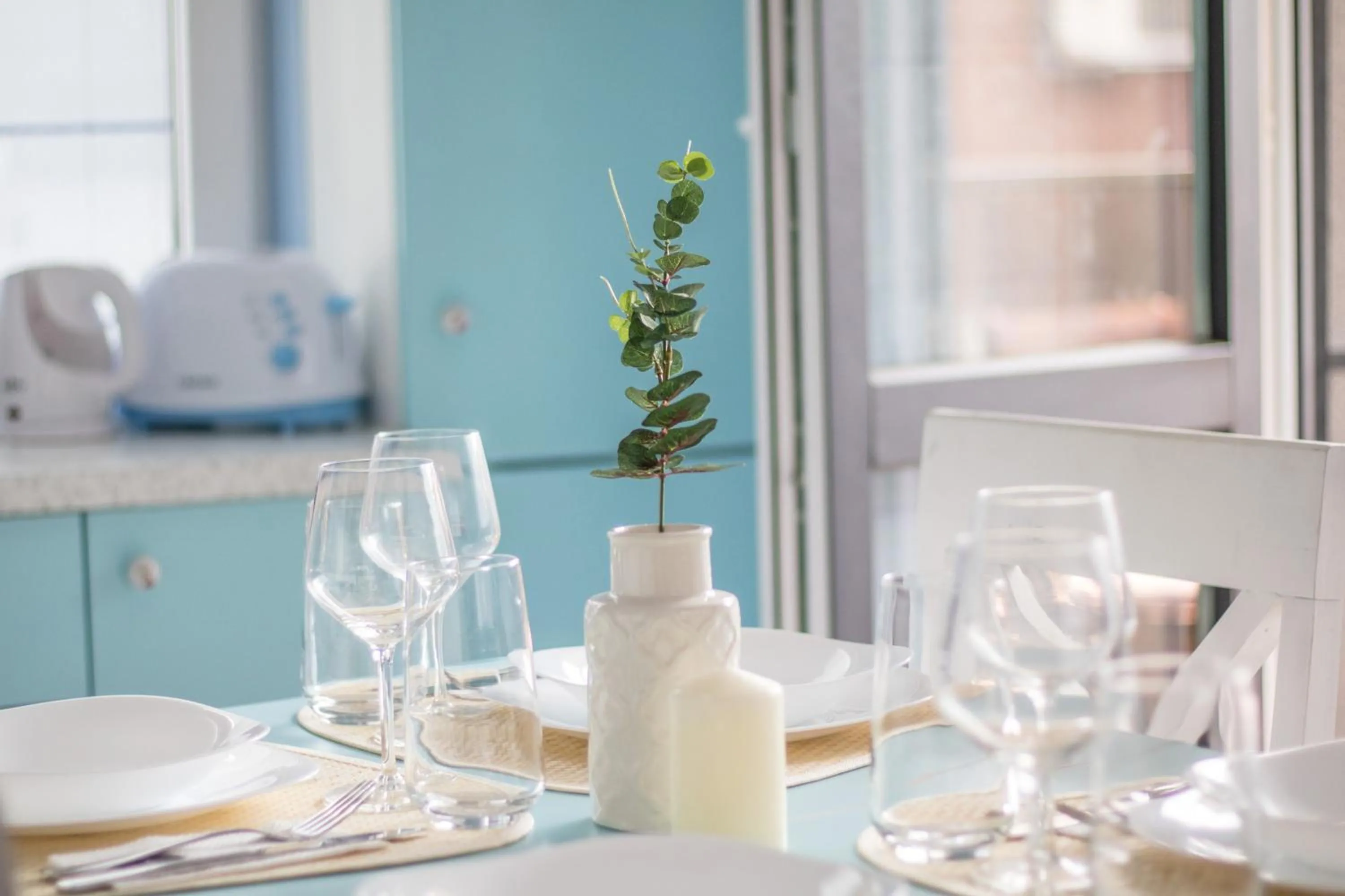 Kitchen or kitchenette in Domus Apartments City Center with Parking