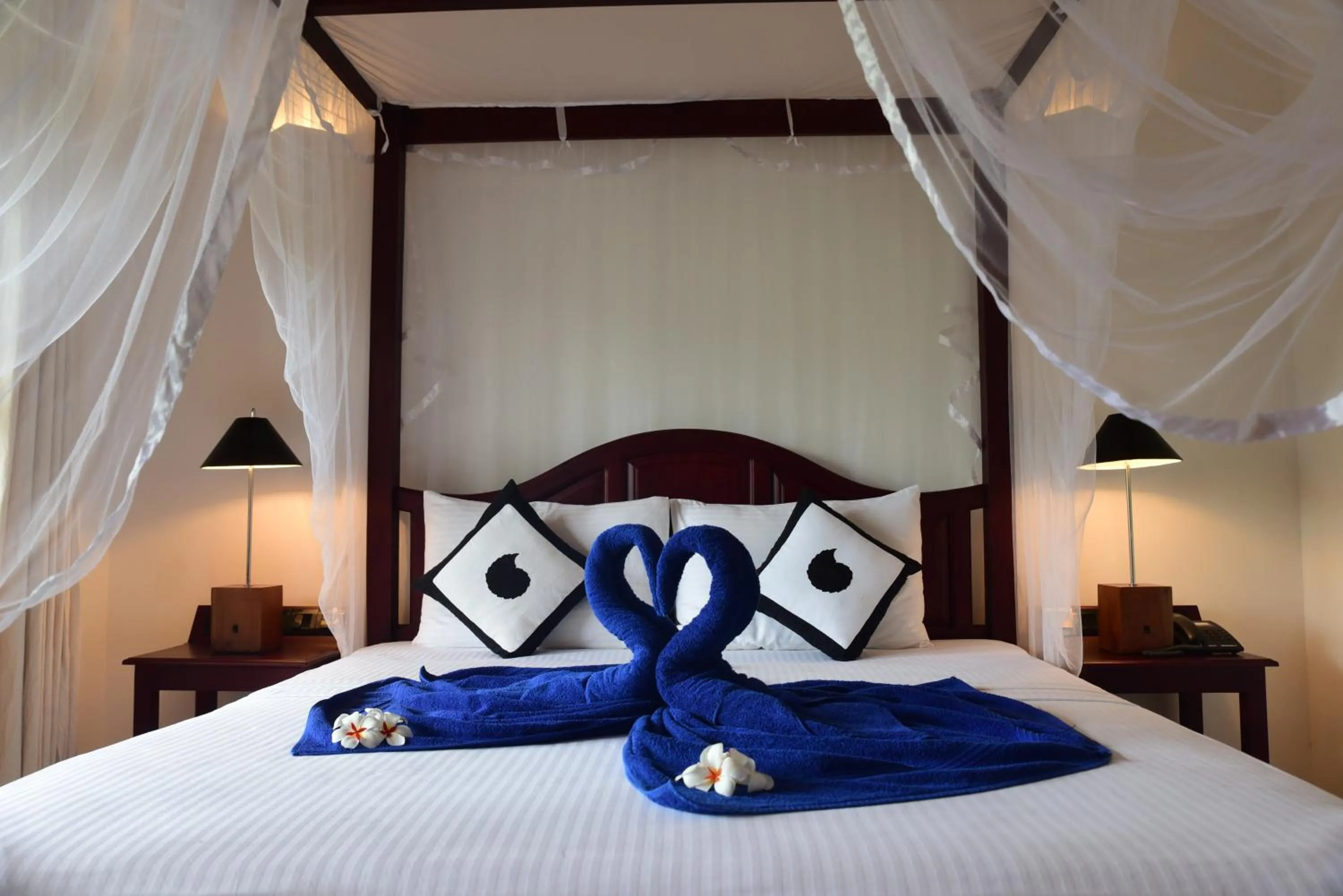 Bed in Amal Beach Hotel