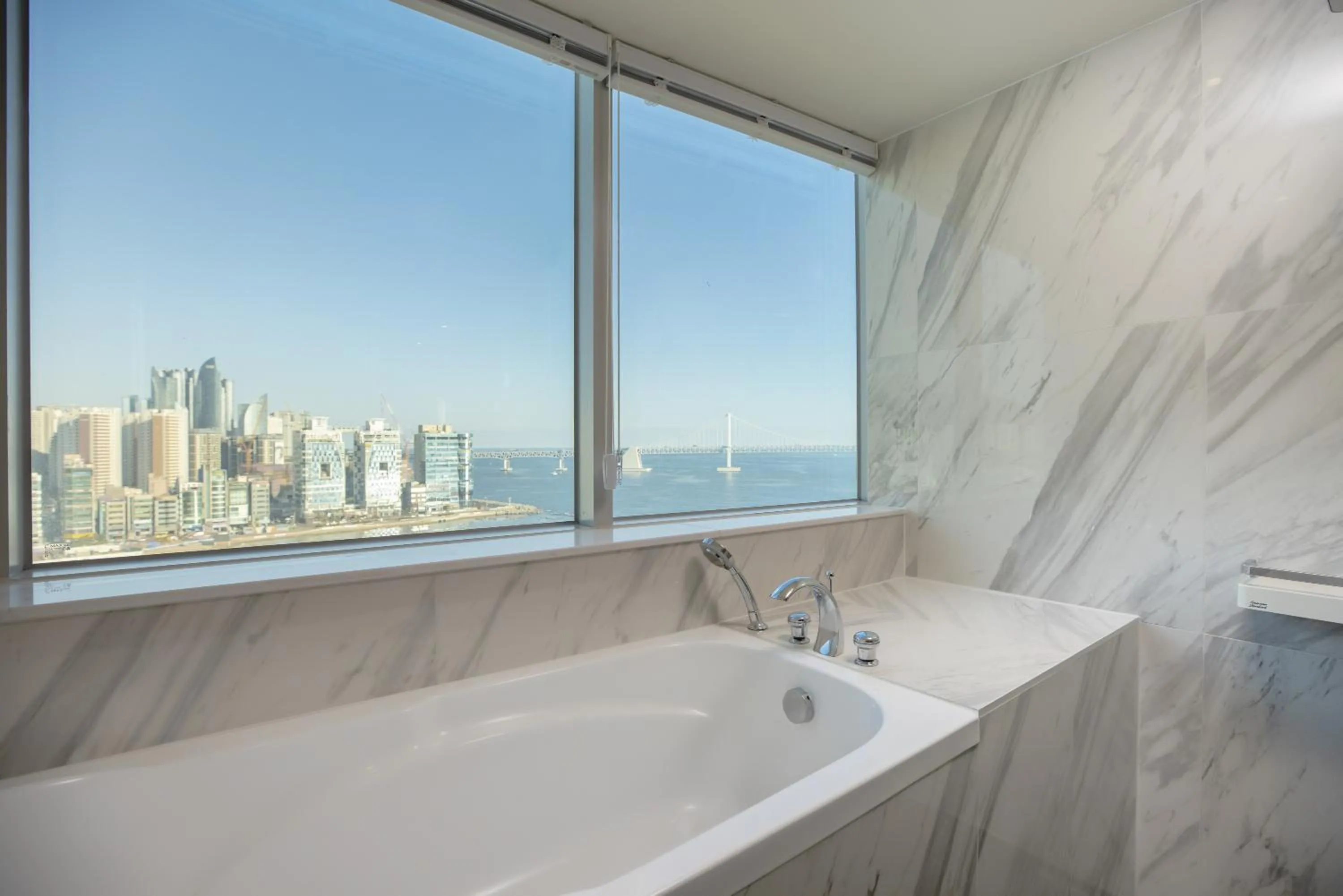 Toilet in Kent Hotel Gwangalli by Kensington