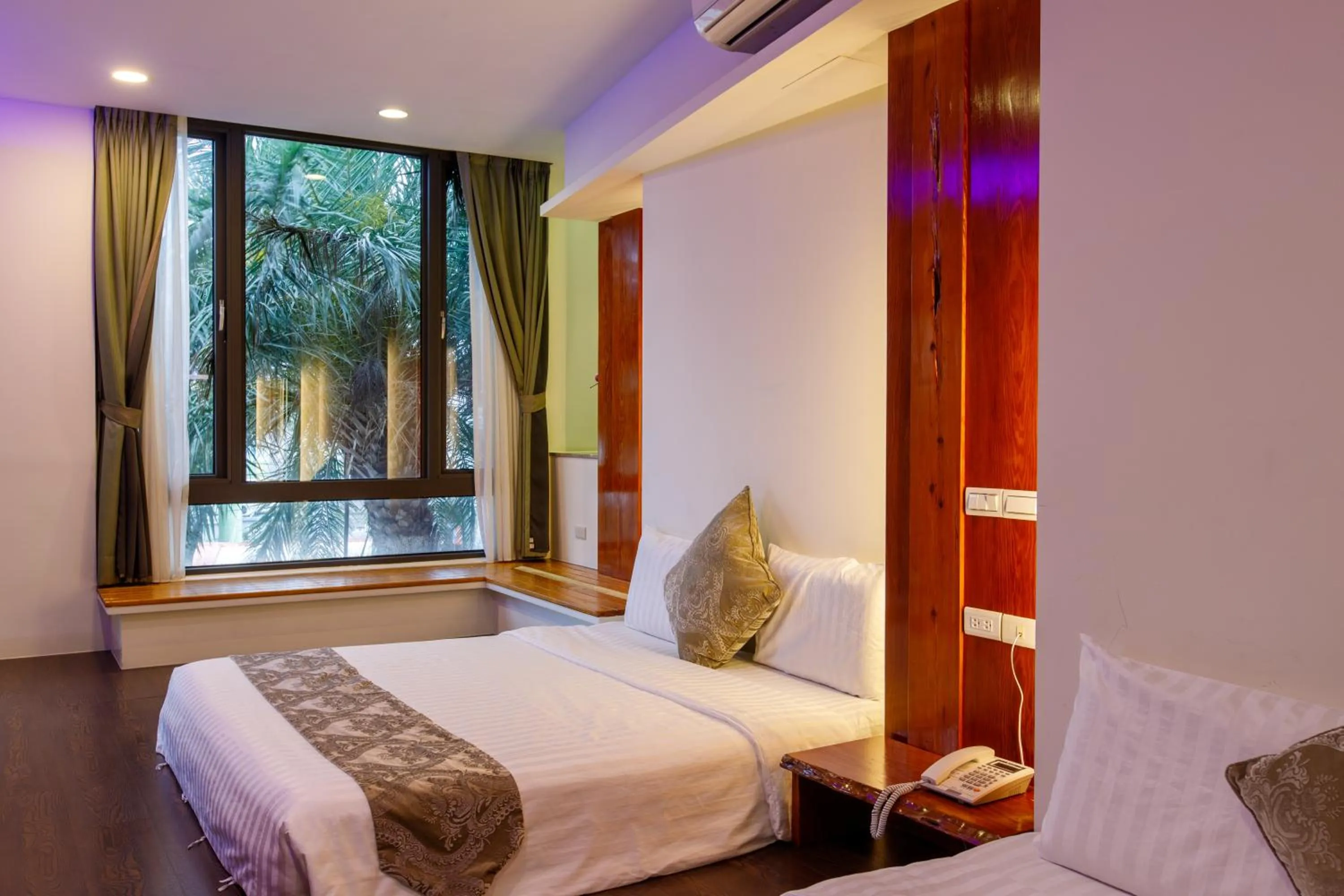 Bed in Oceanic Pearl Resort