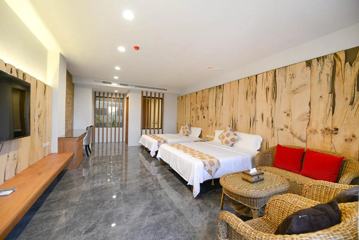 Bed in Oceanic Pearl Resort