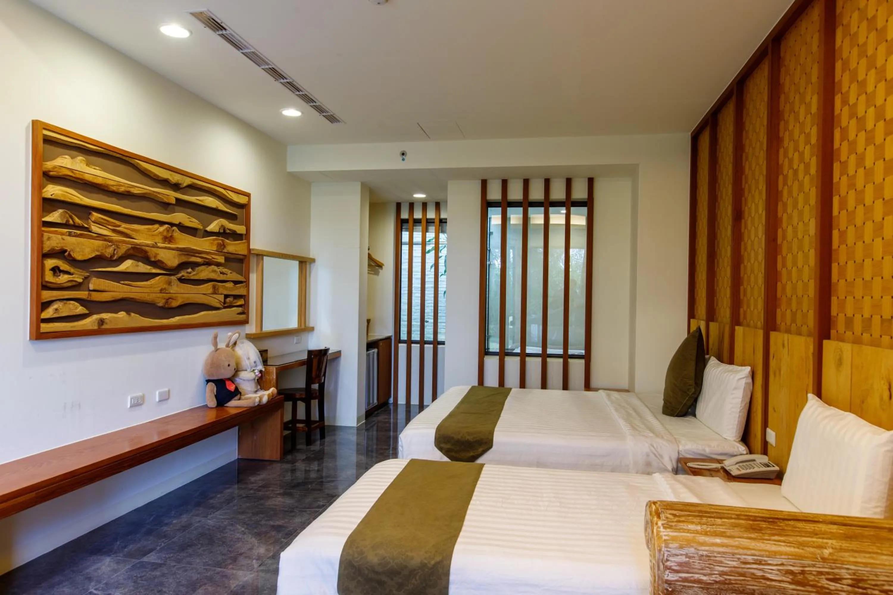 Bed in Oceanic Pearl Resort