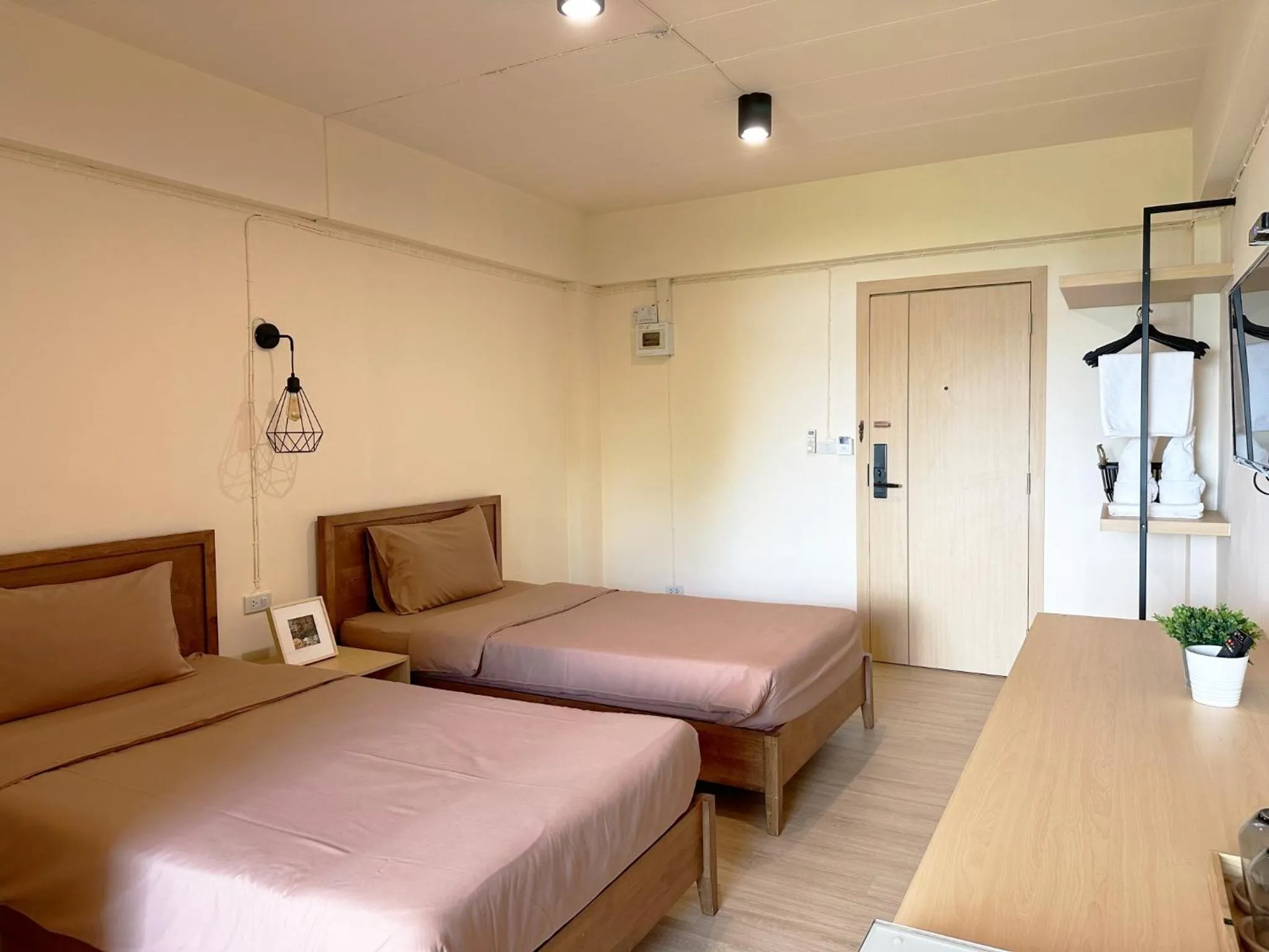 Bed in I-Home Residence and Hotel