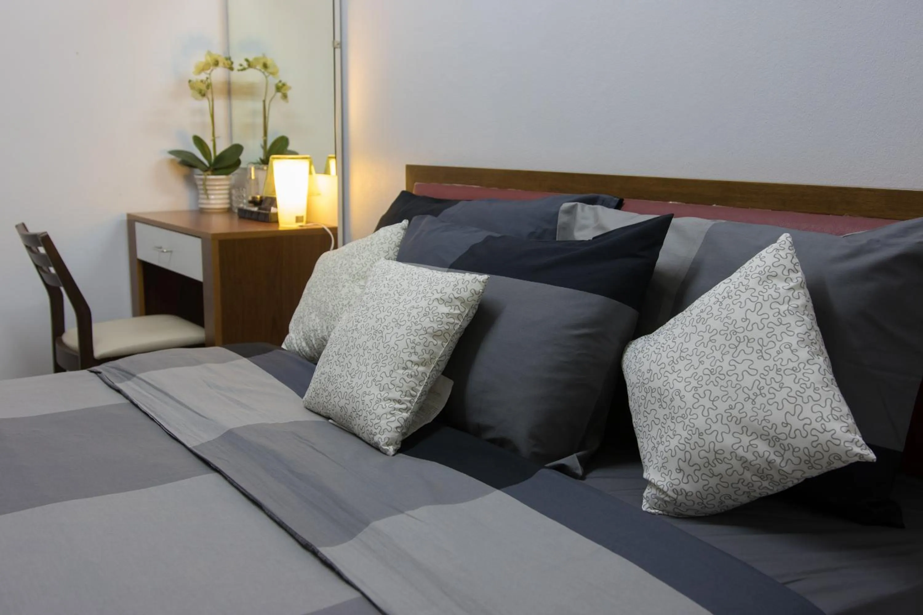 Bed in I-Home Residence and Hotel