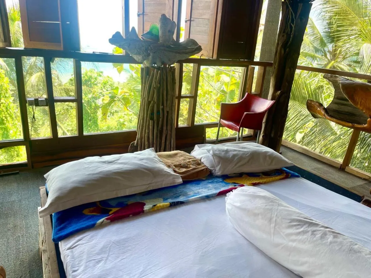 Bed in Karang Aji Beach Villa