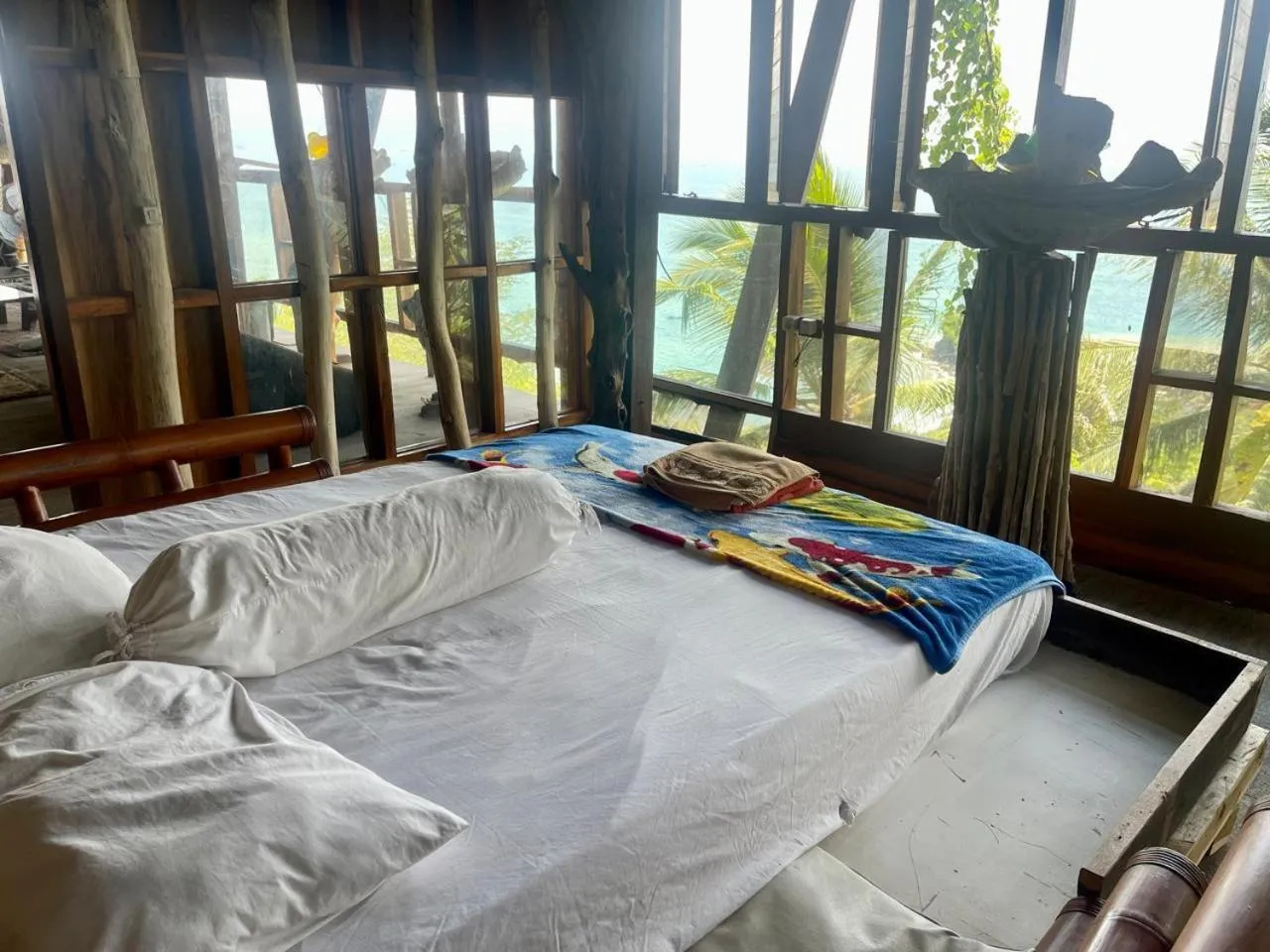 Bed in Karang Aji Beach Villa