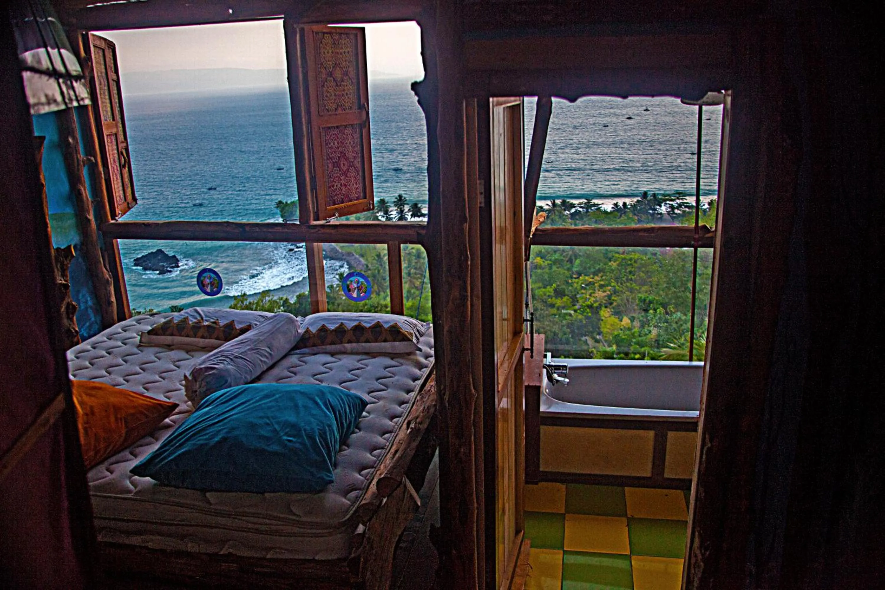 Bed in Karang Aji Beach Villa