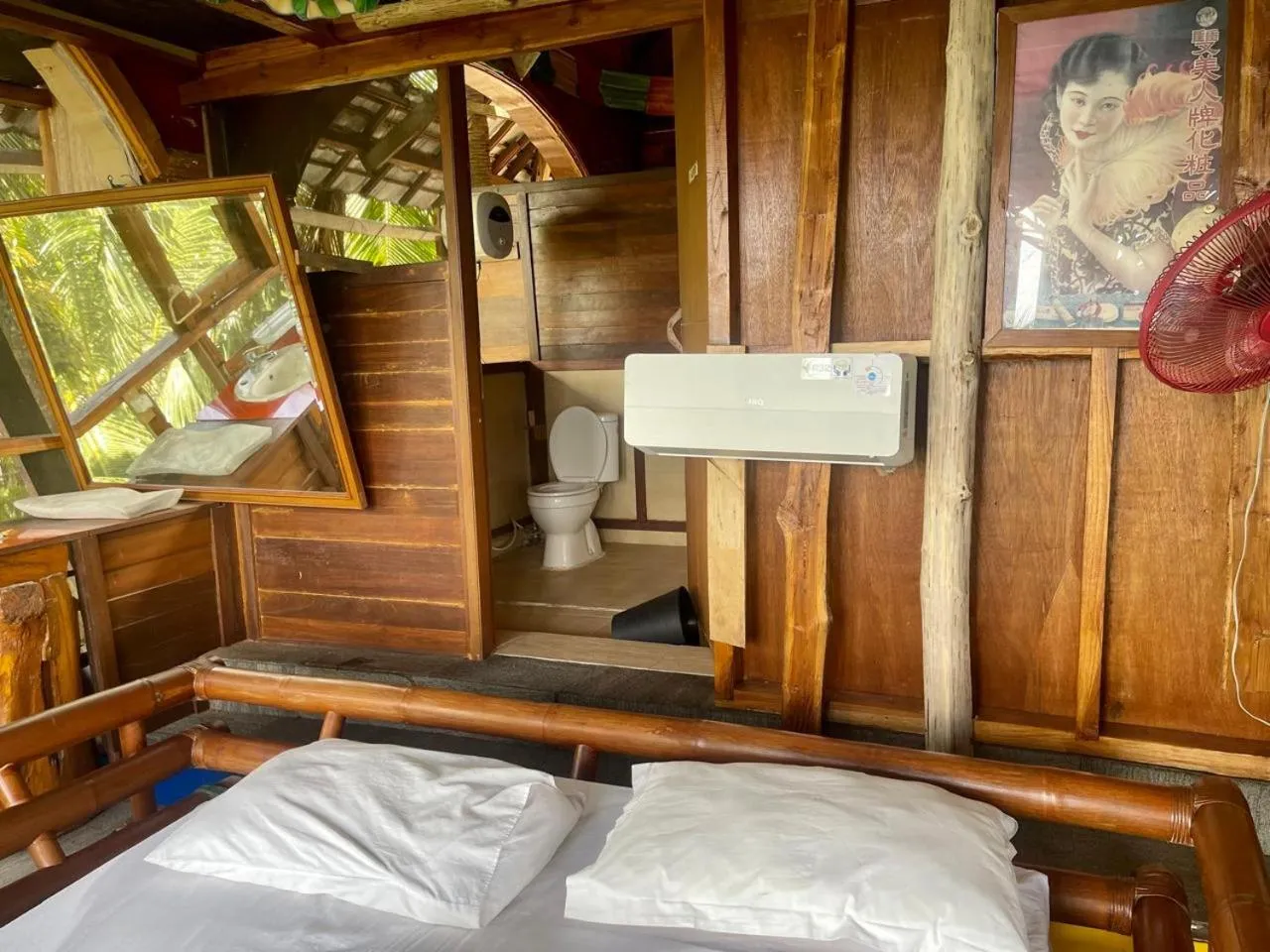 Bed in Karang Aji Beach Villa