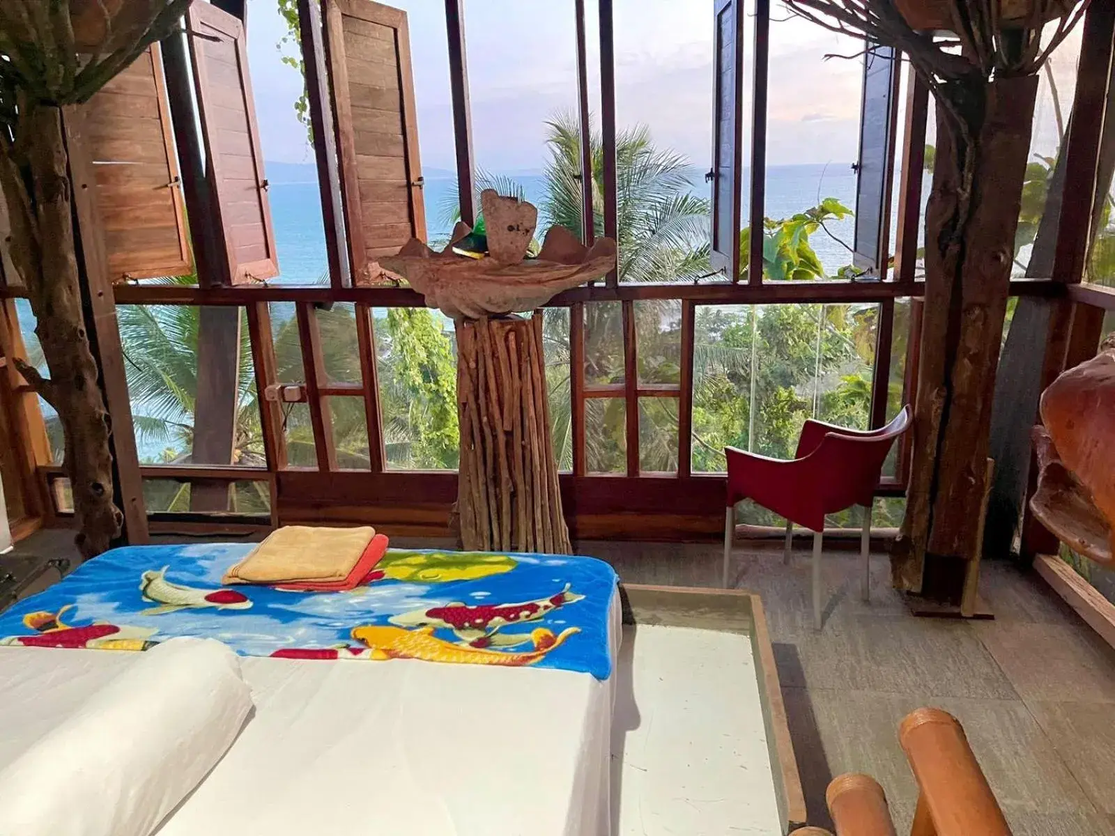 Bed in Karang Aji Beach Villa Bed in Karang Aji Beach Villa