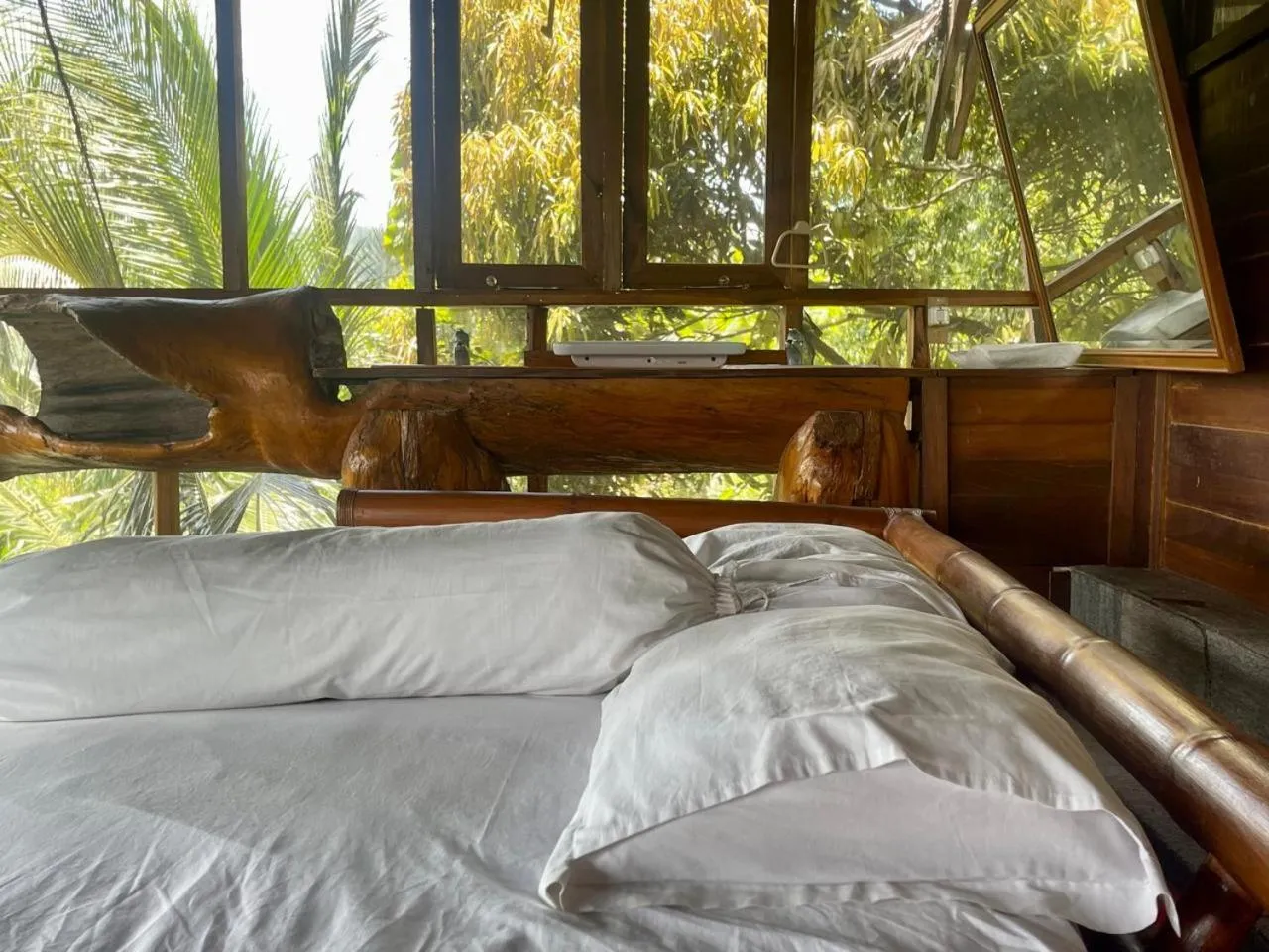 Bed in Karang Aji Beach Villa