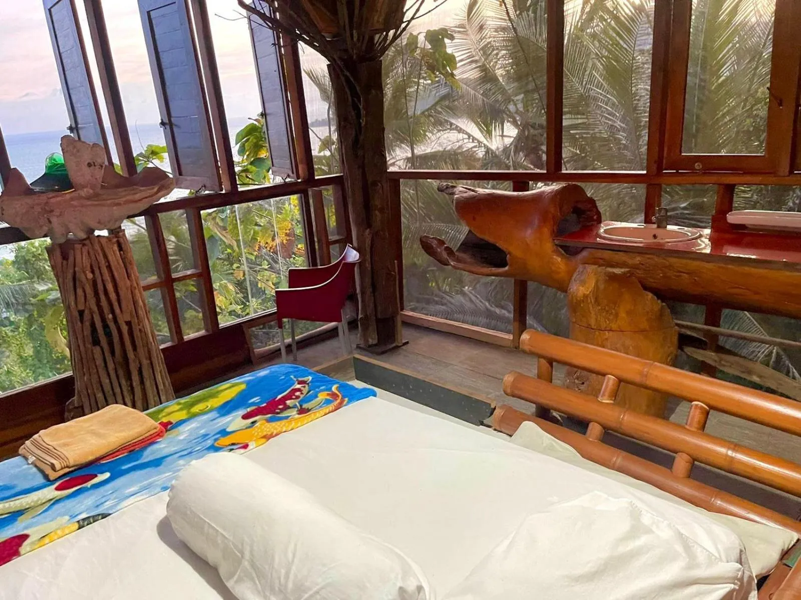 Bed in Karang Aji Beach Villa