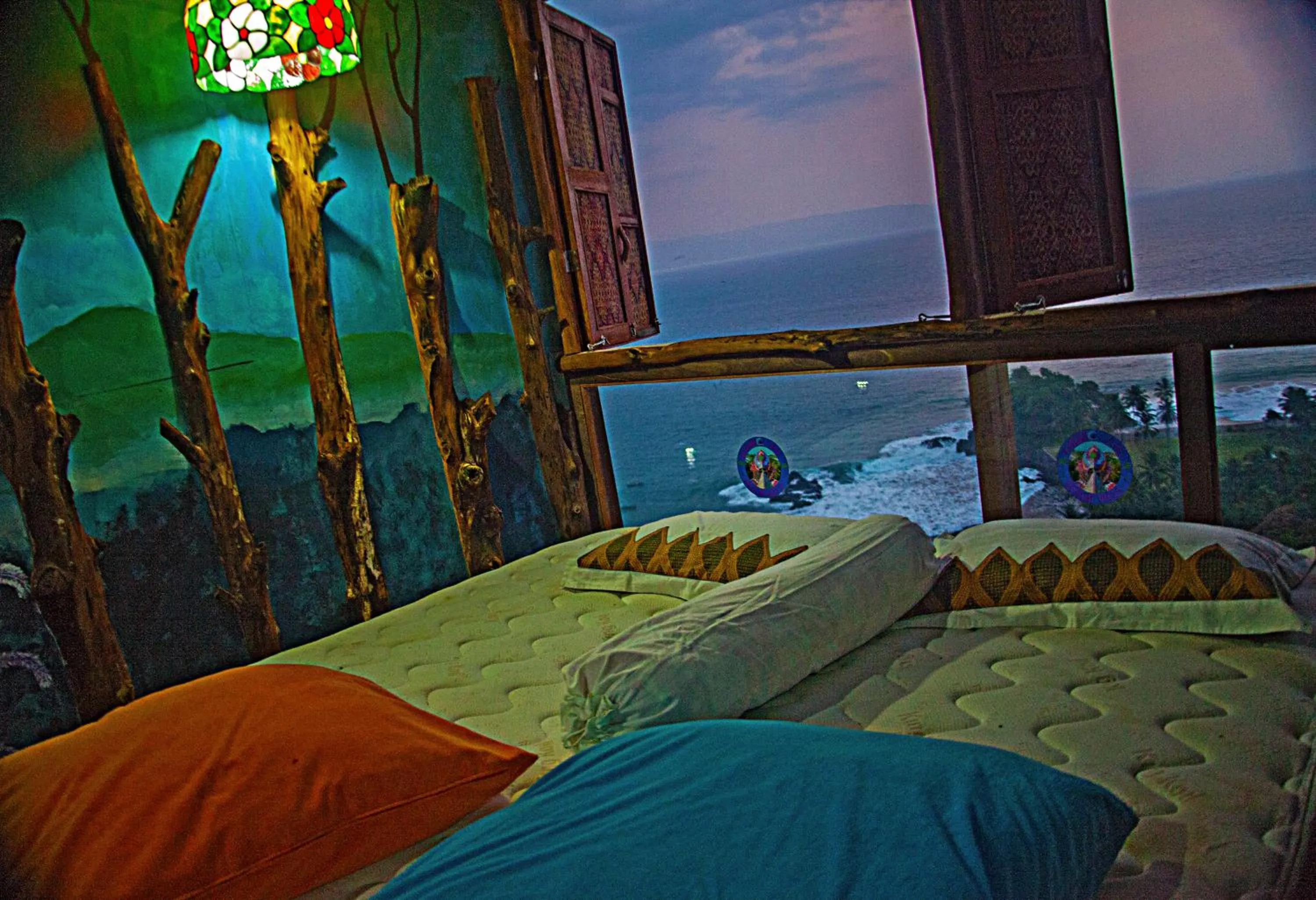 Bed in Karang Aji Beach Villa