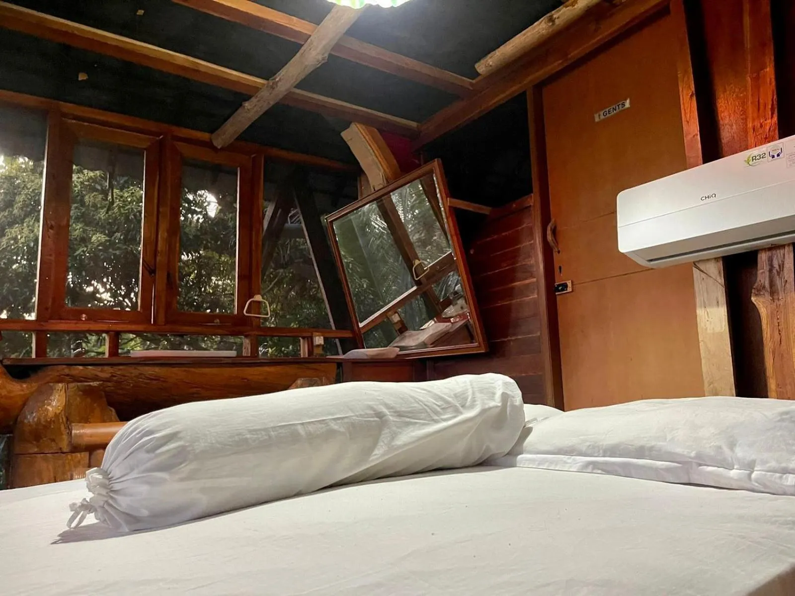 Bed in Karang Aji Beach Villa