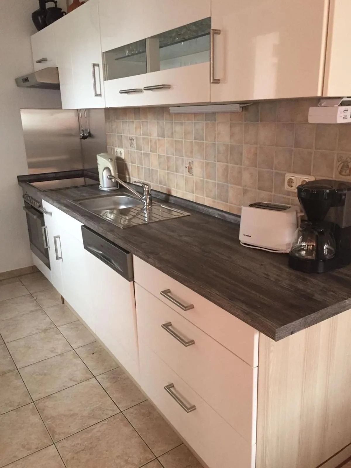 Kitchen or kitchenette in Feriendomizil am Hafen