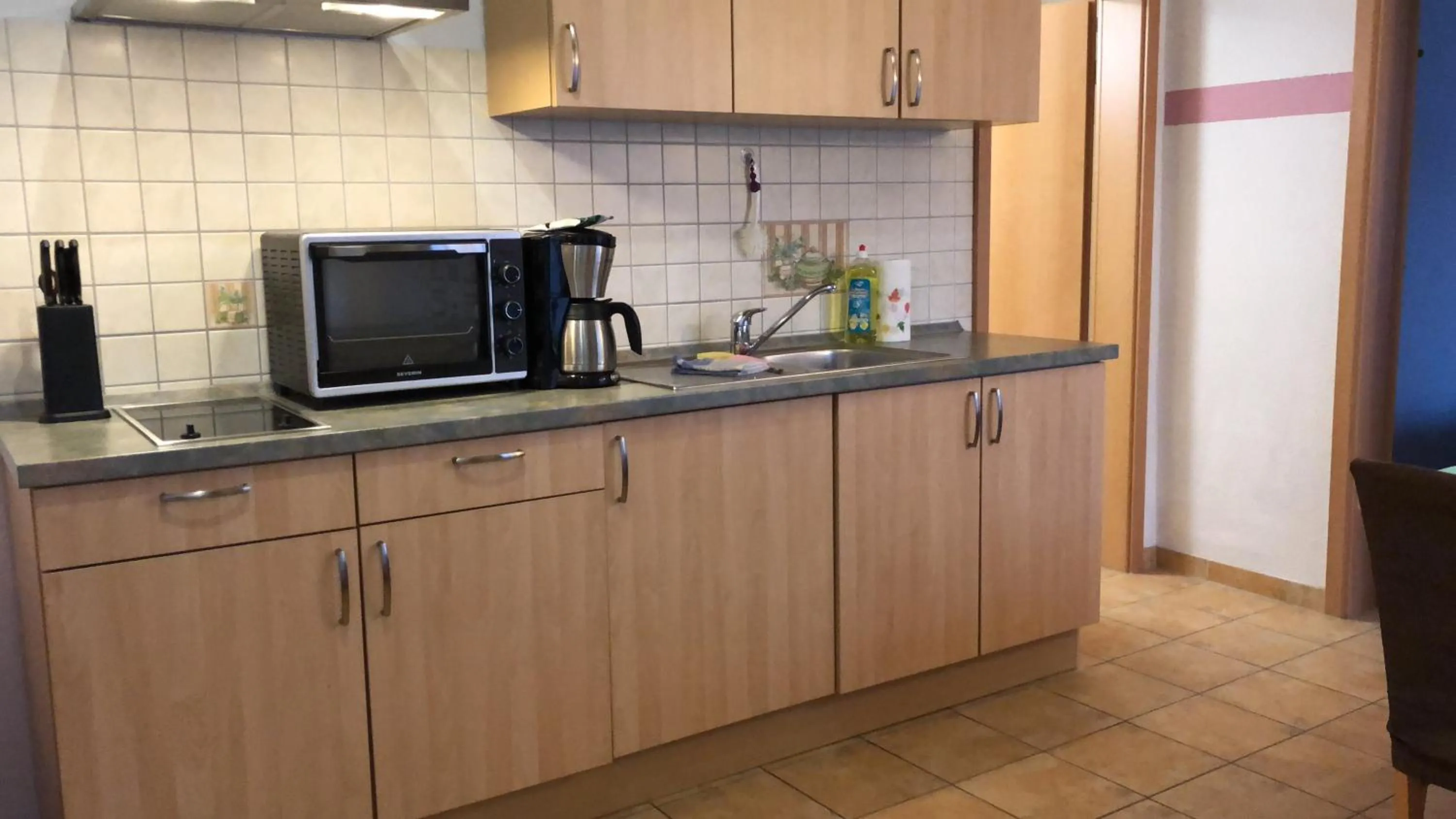 Kitchen or kitchenette in Feriendomizil am Hafen