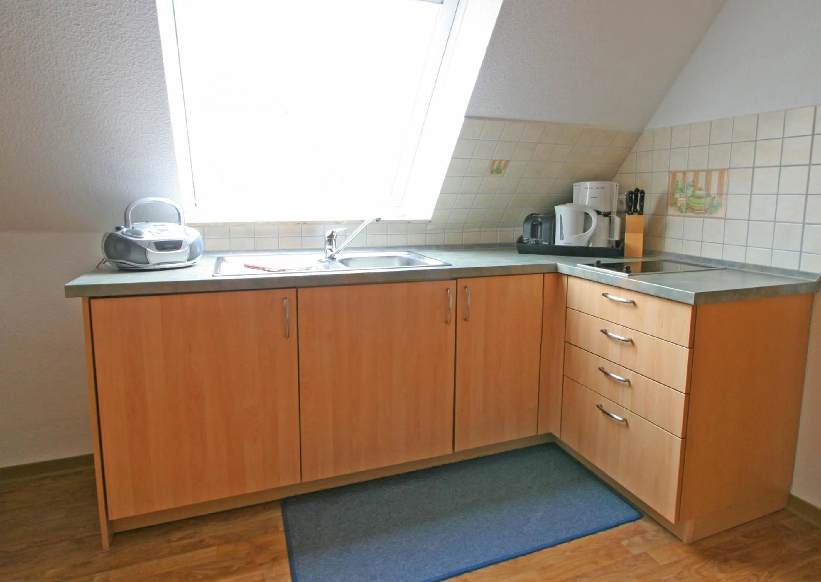 Kitchen or kitchenette in Feriendomizil am Hafen