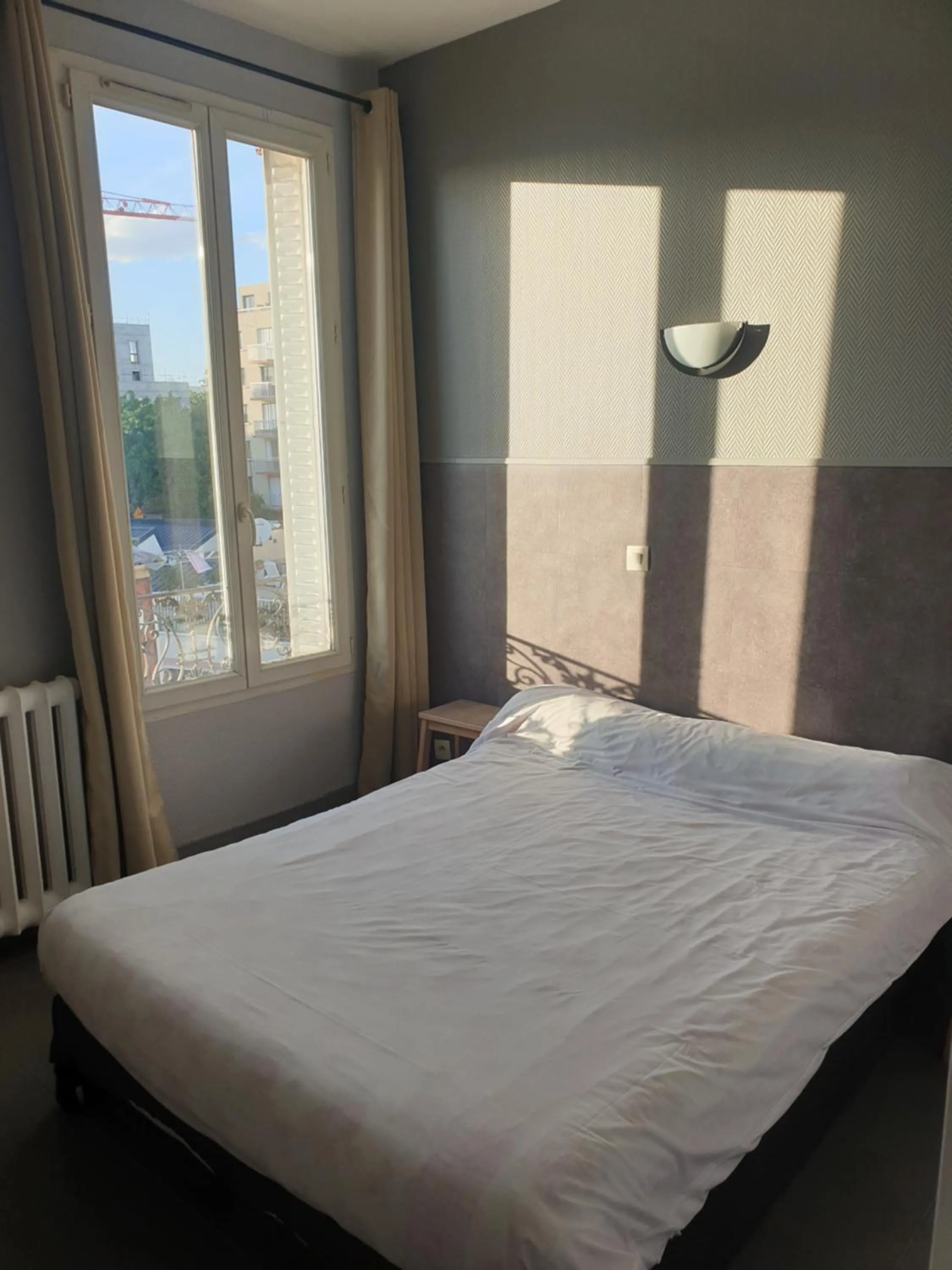 Bed in Hôtel Belfort