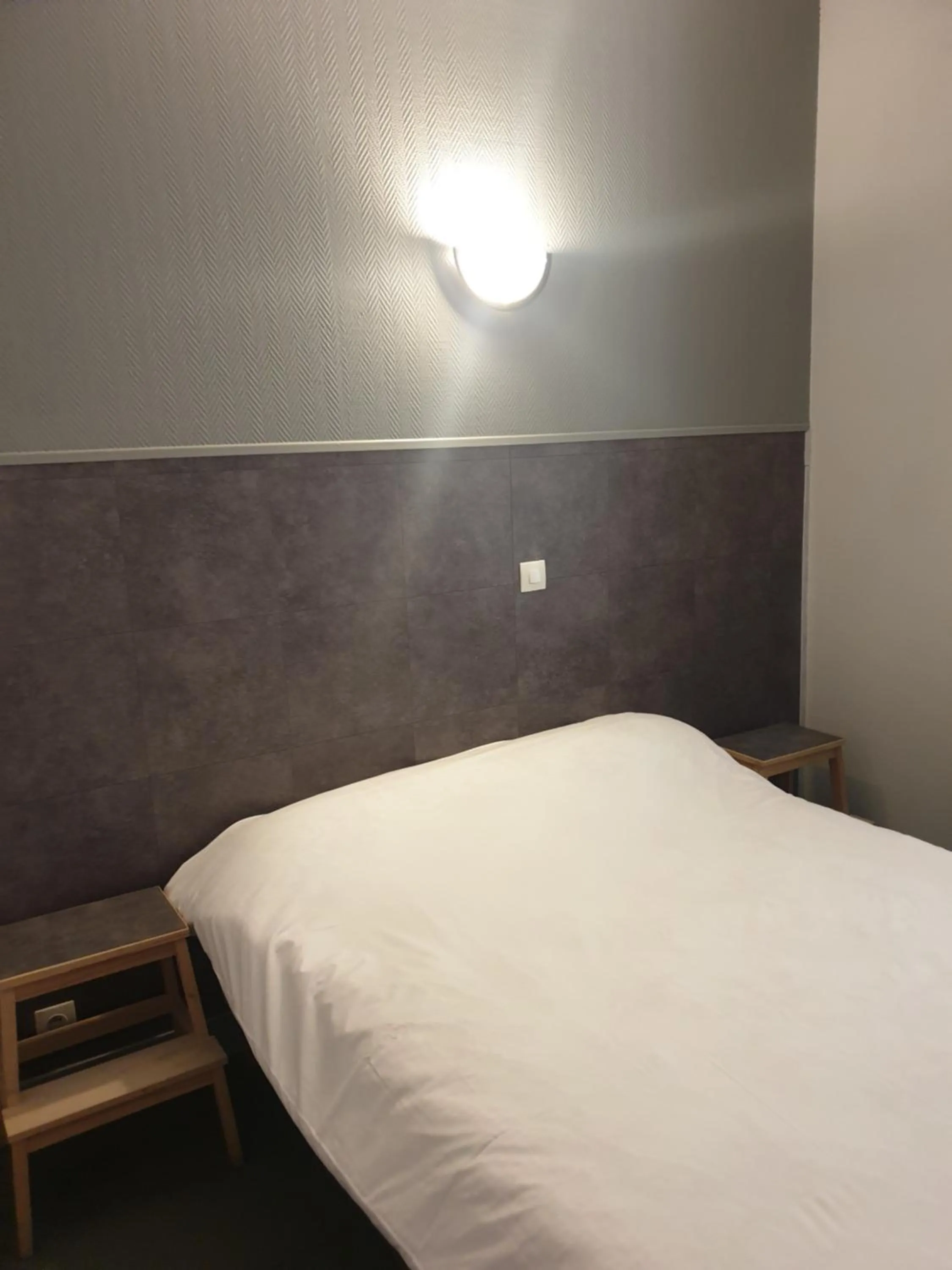 Bed in Hôtel Belfort