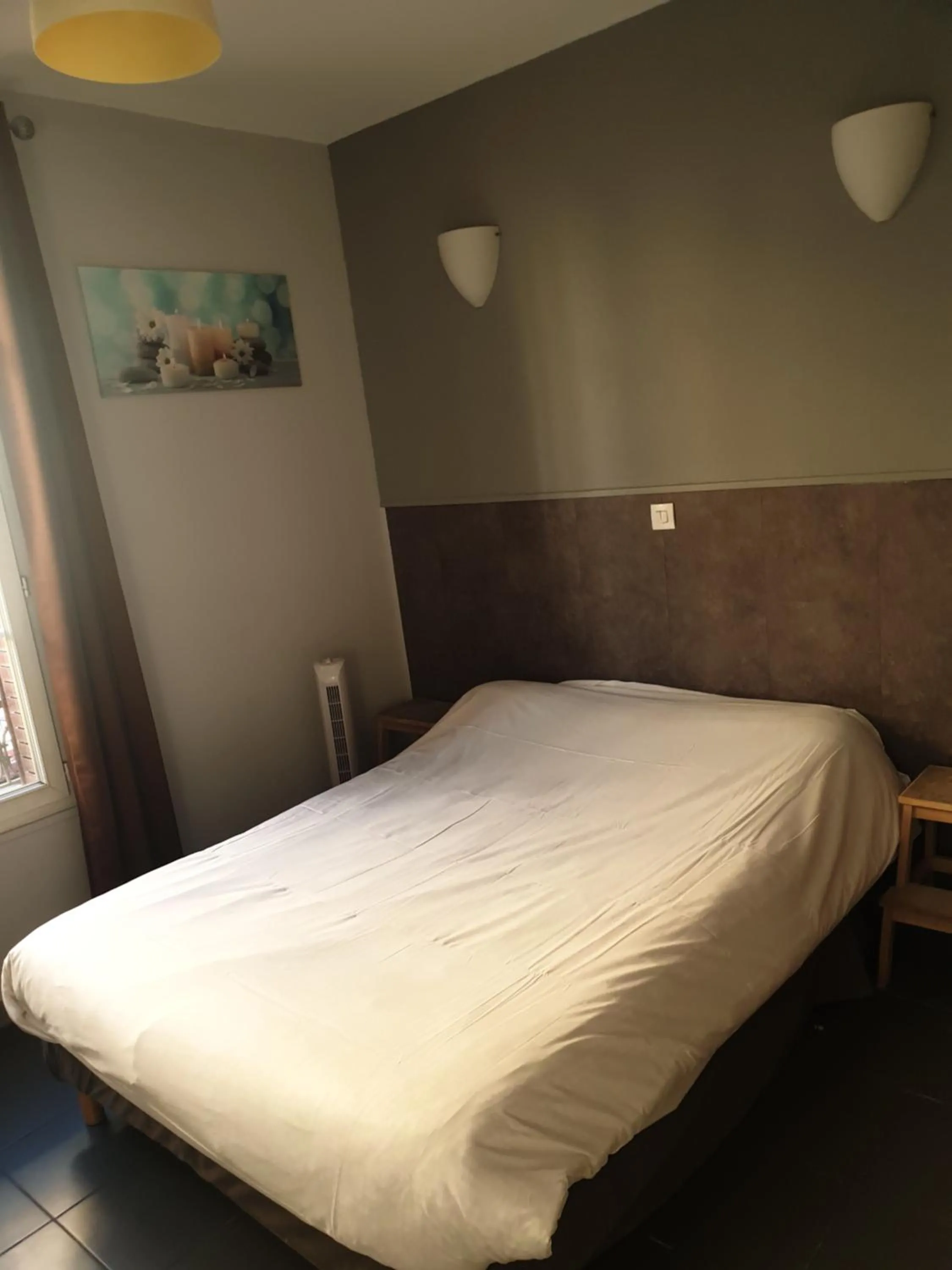 Bed in Hôtel Belfort