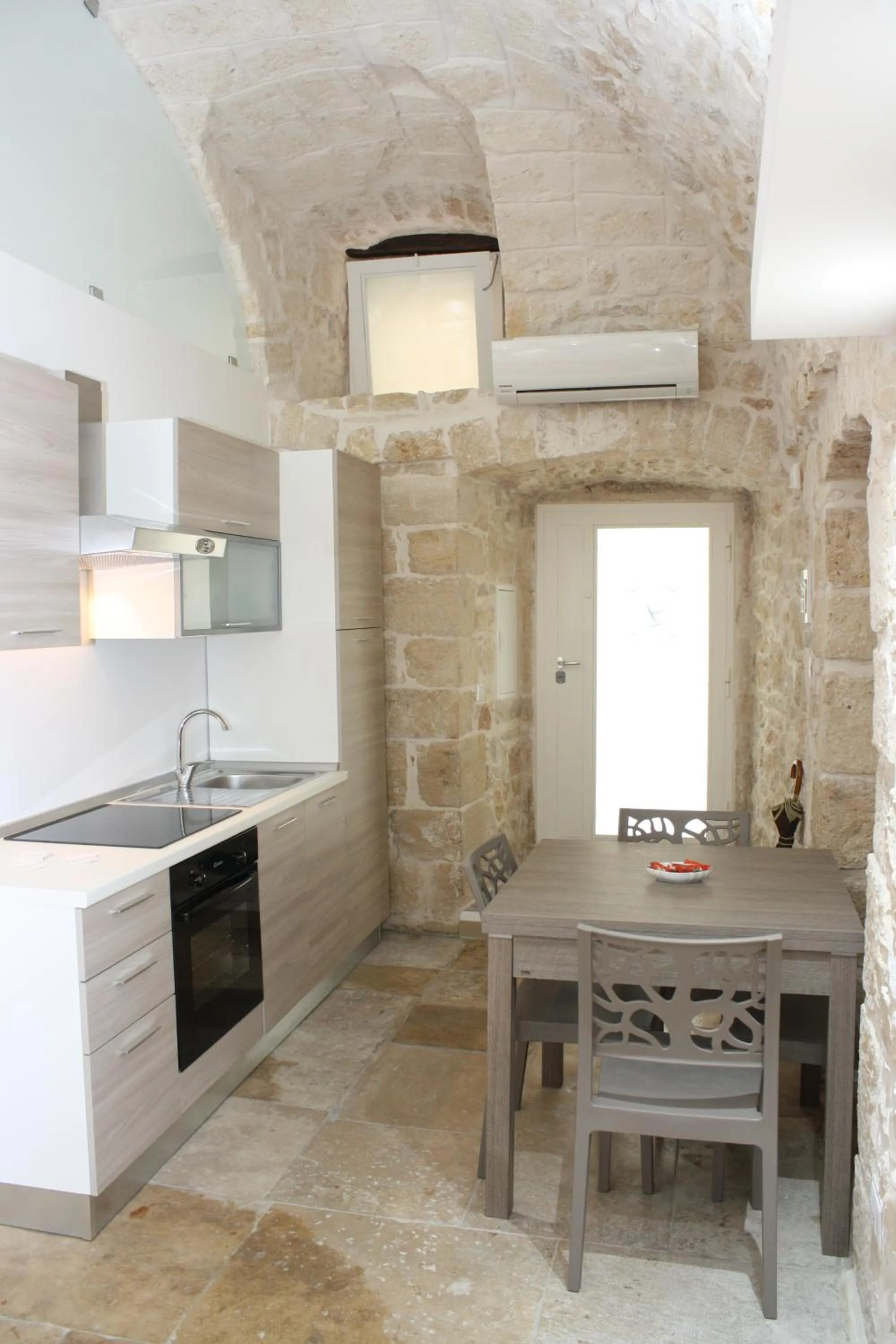 Kitchen or kitchenette in Lilla B&B Luxury Apartments