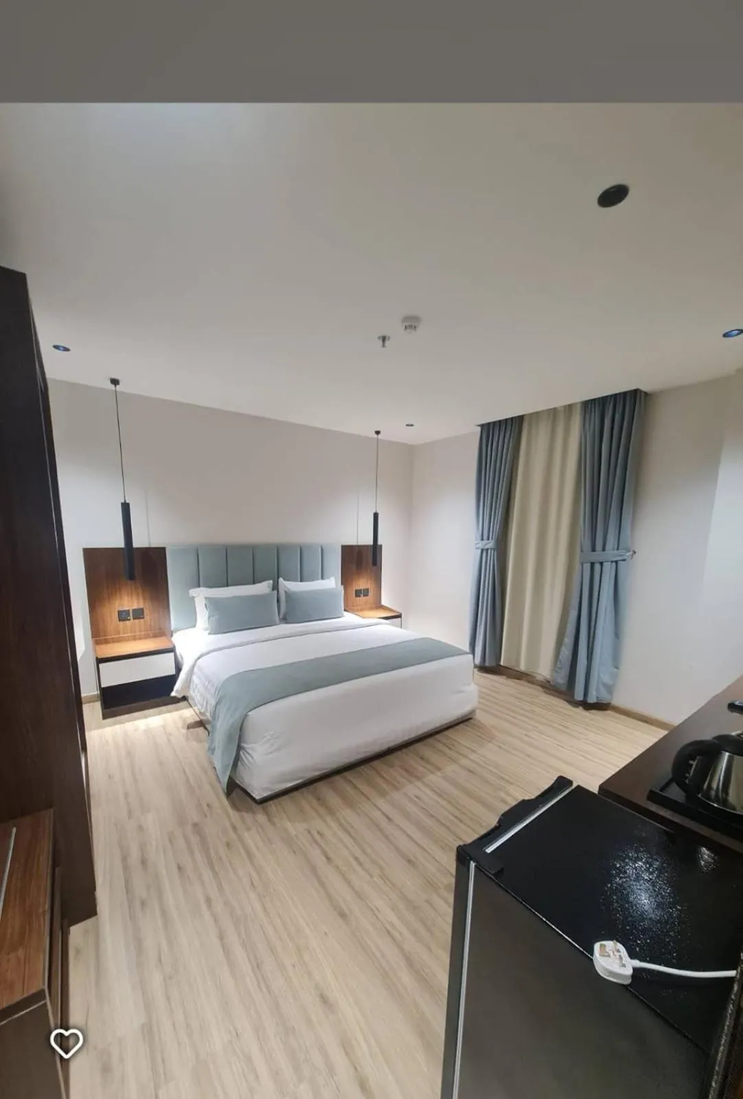 TV and multimedia, Bed in Makarim Al Nakheel serviced apartments