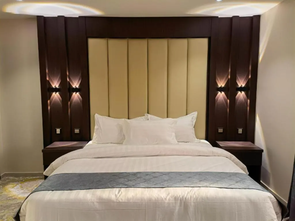Bed in Makarim Palm Hotel
