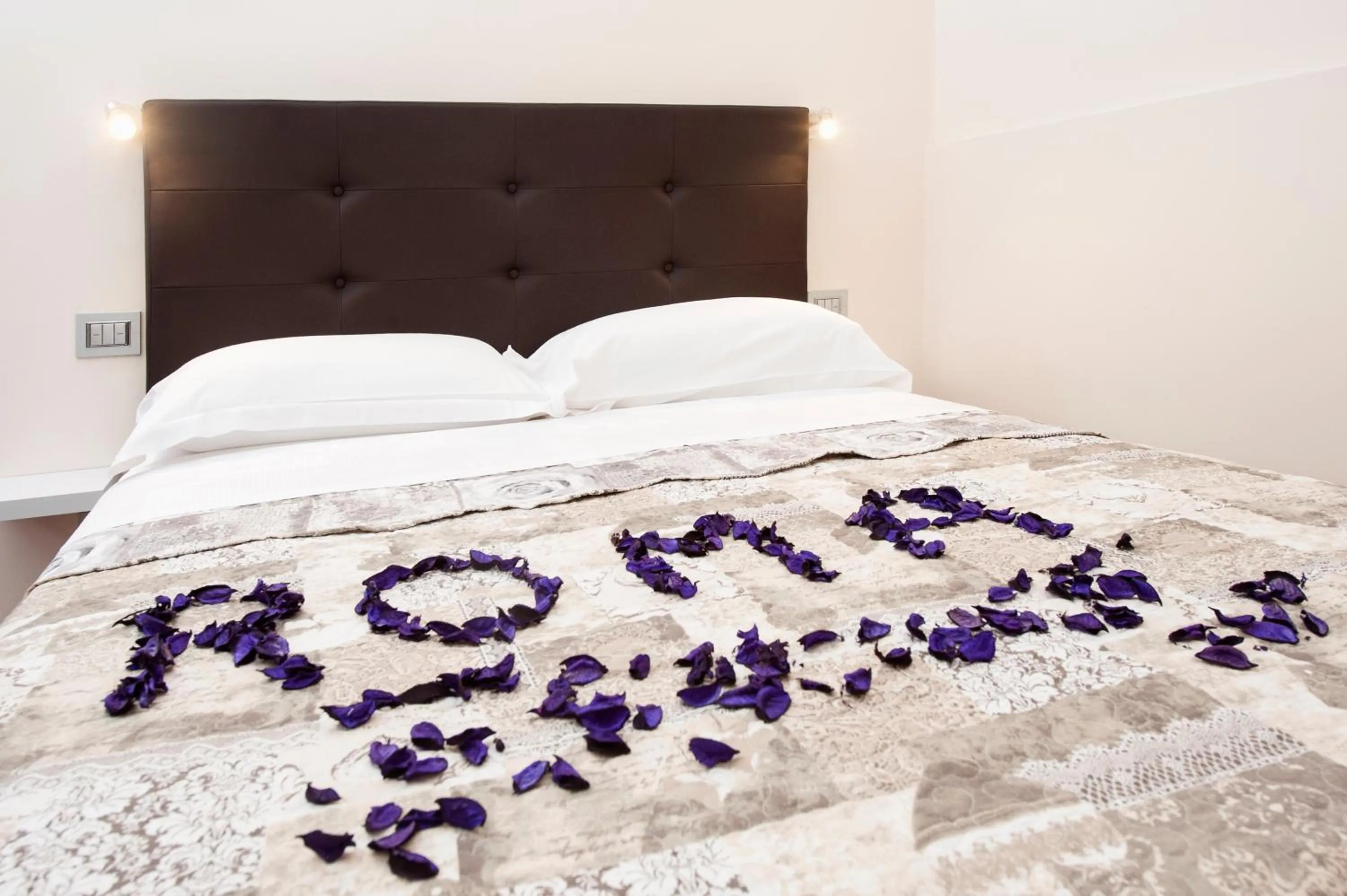 Decorative detail, Bed in Trinity Luxury Rooms