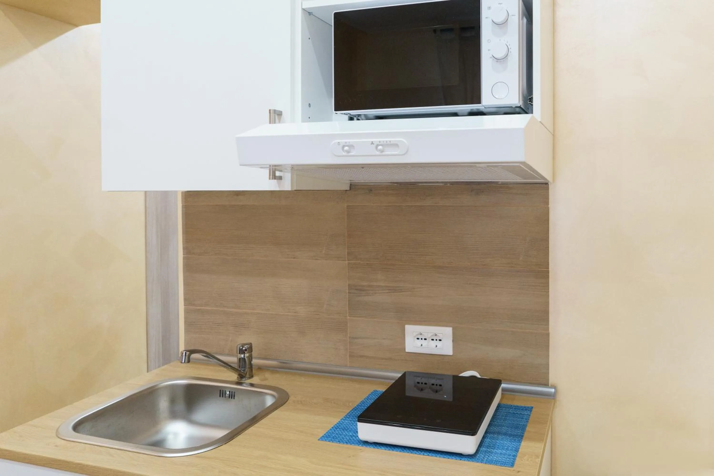 Kitchen or kitchenette in Trinity Luxury Rooms