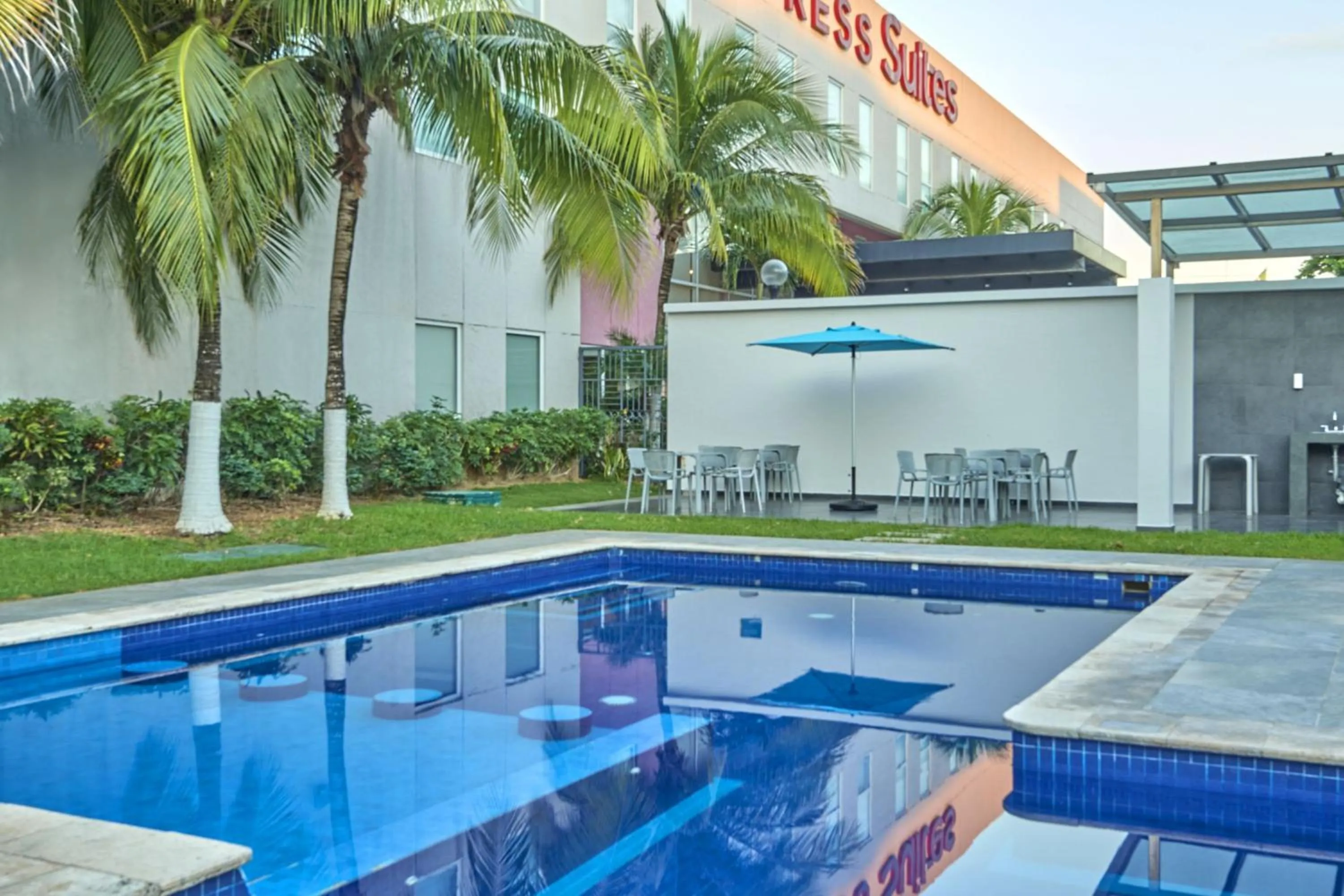 Swimming pool in City Express Suites by Marriott Playa del Carmen
