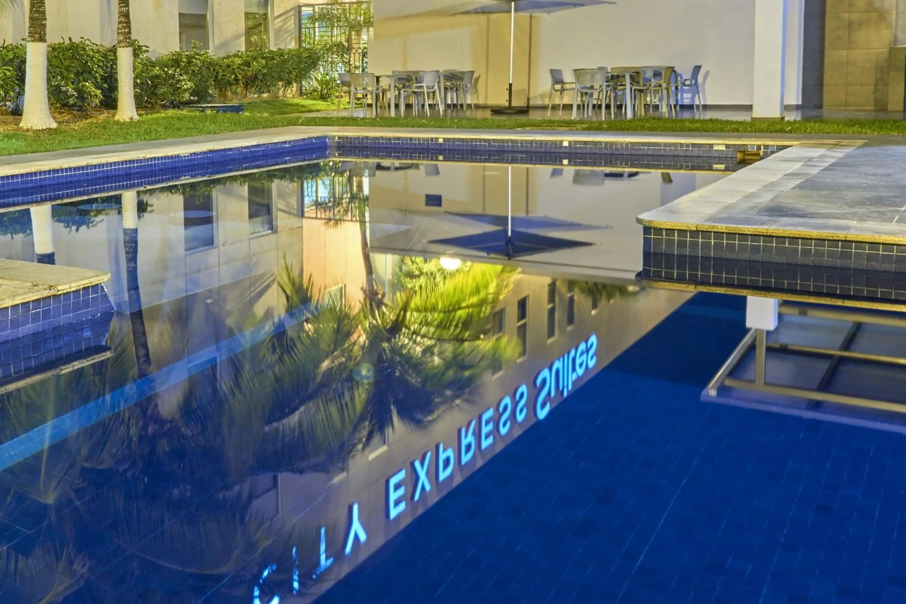 Swimming pool in City Express Suites by Marriott Playa del Carmen