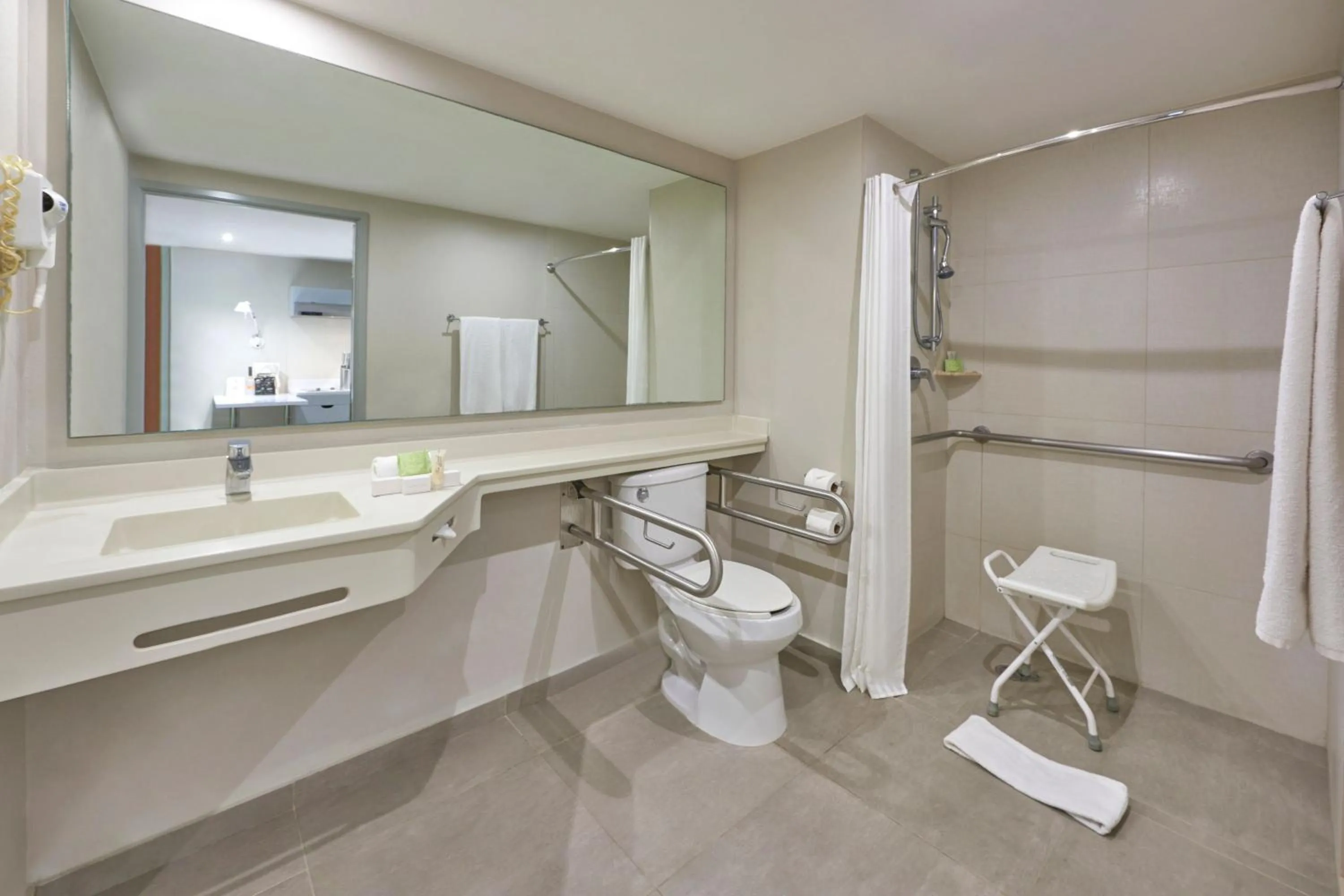Bathroom in City Express Suites by Marriott Playa del Carmen