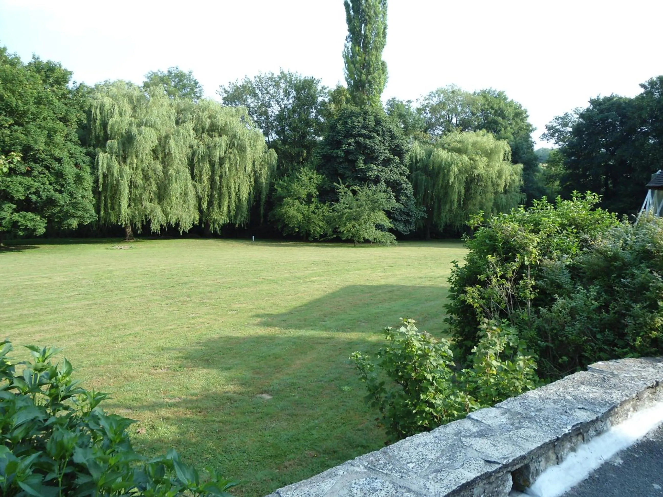 Garden view in B&B La Maison de L'Aubette