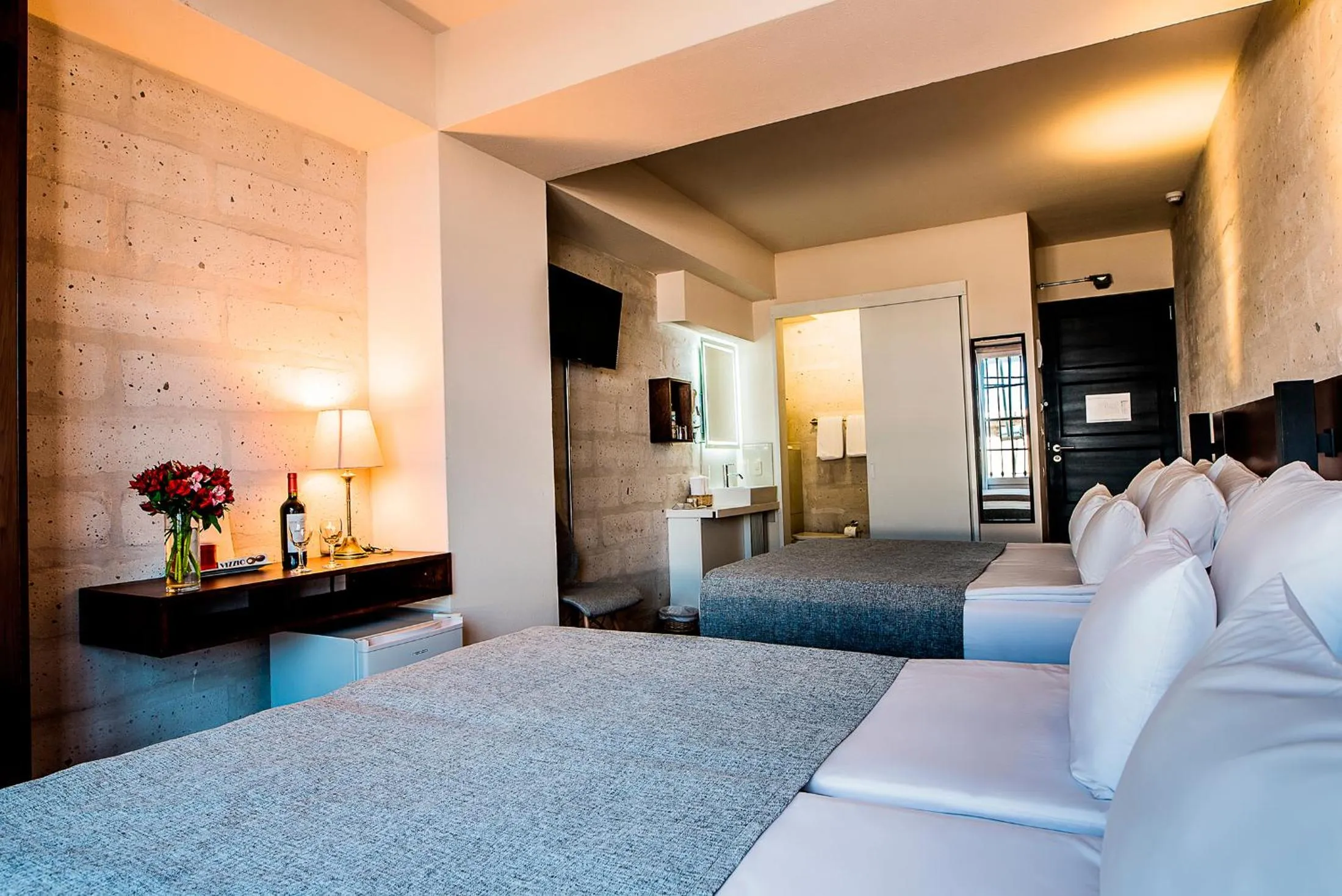 Seating area, Bed in Palla Boutique Hotel