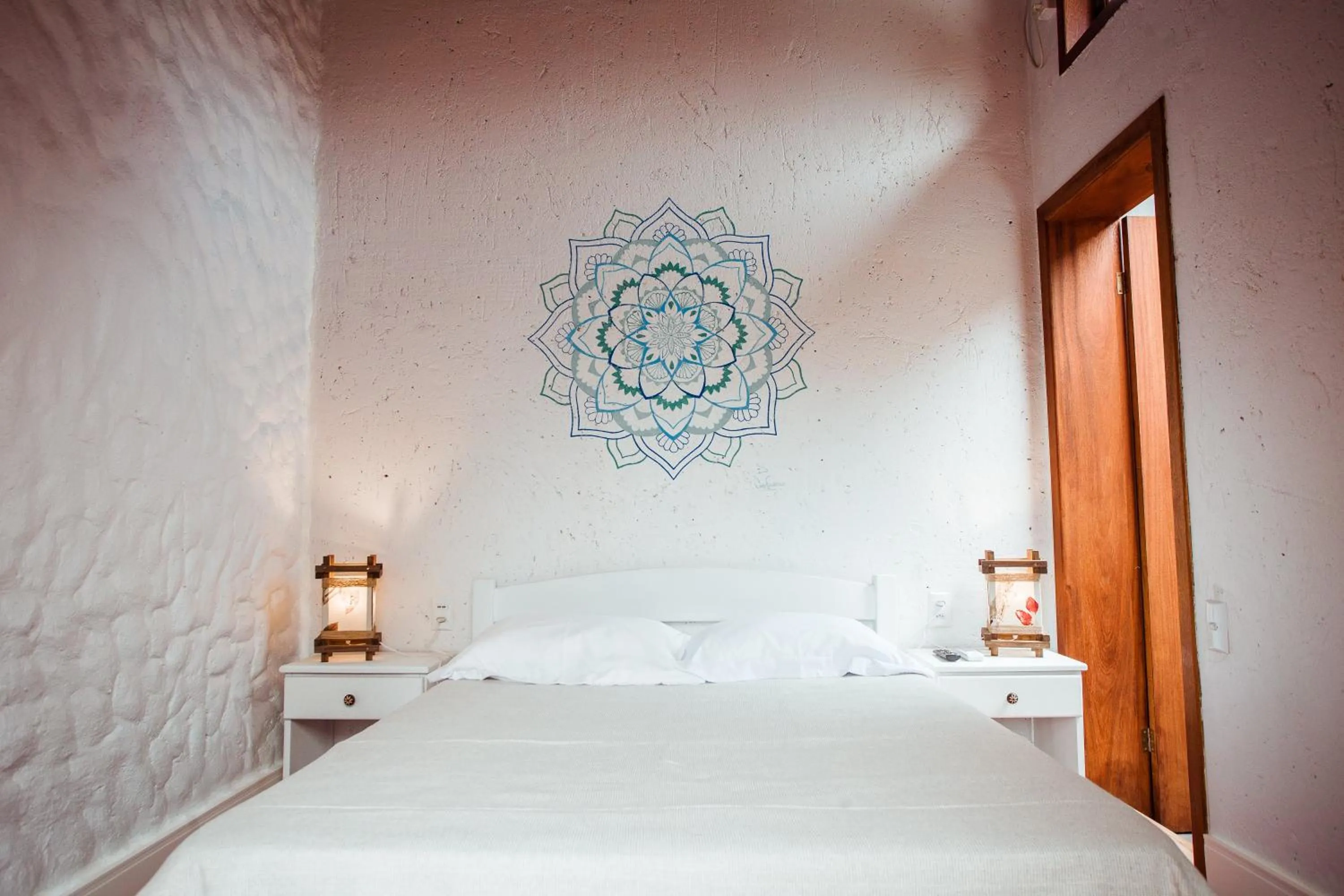 Bed in Pousada Villa Seychelles