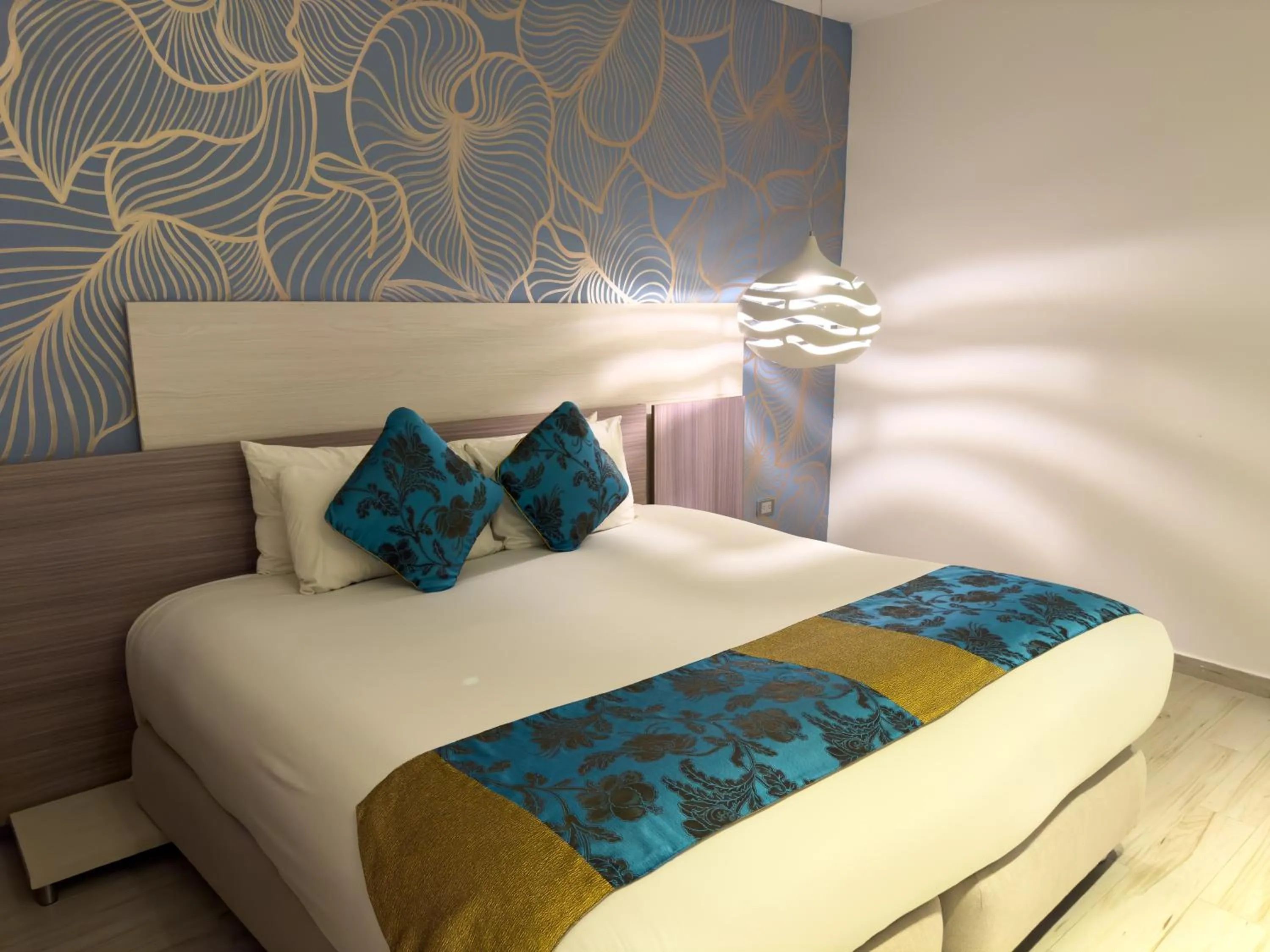 Bed in Hotel Catedral Plaza