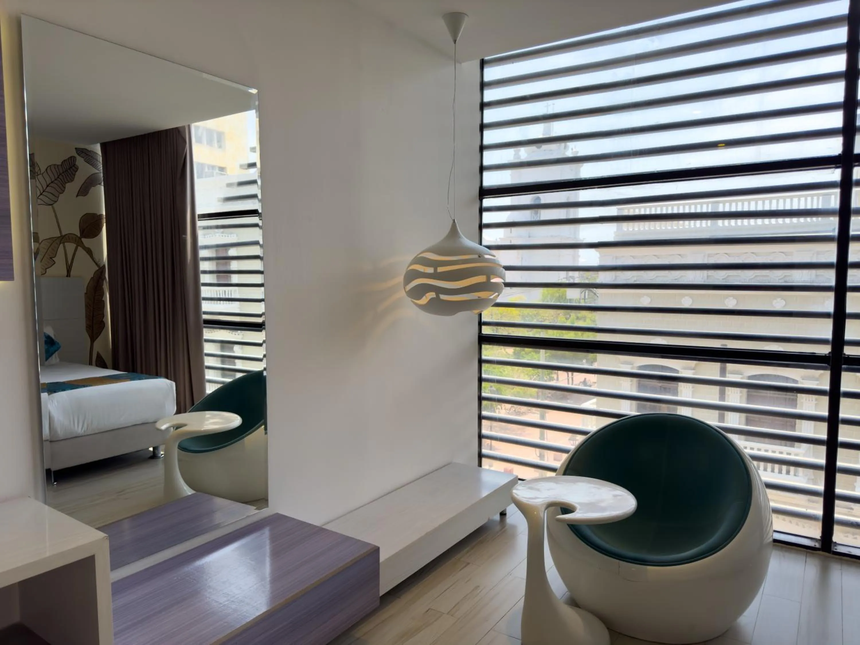 Seating area, Bed in Hotel Catedral Plaza