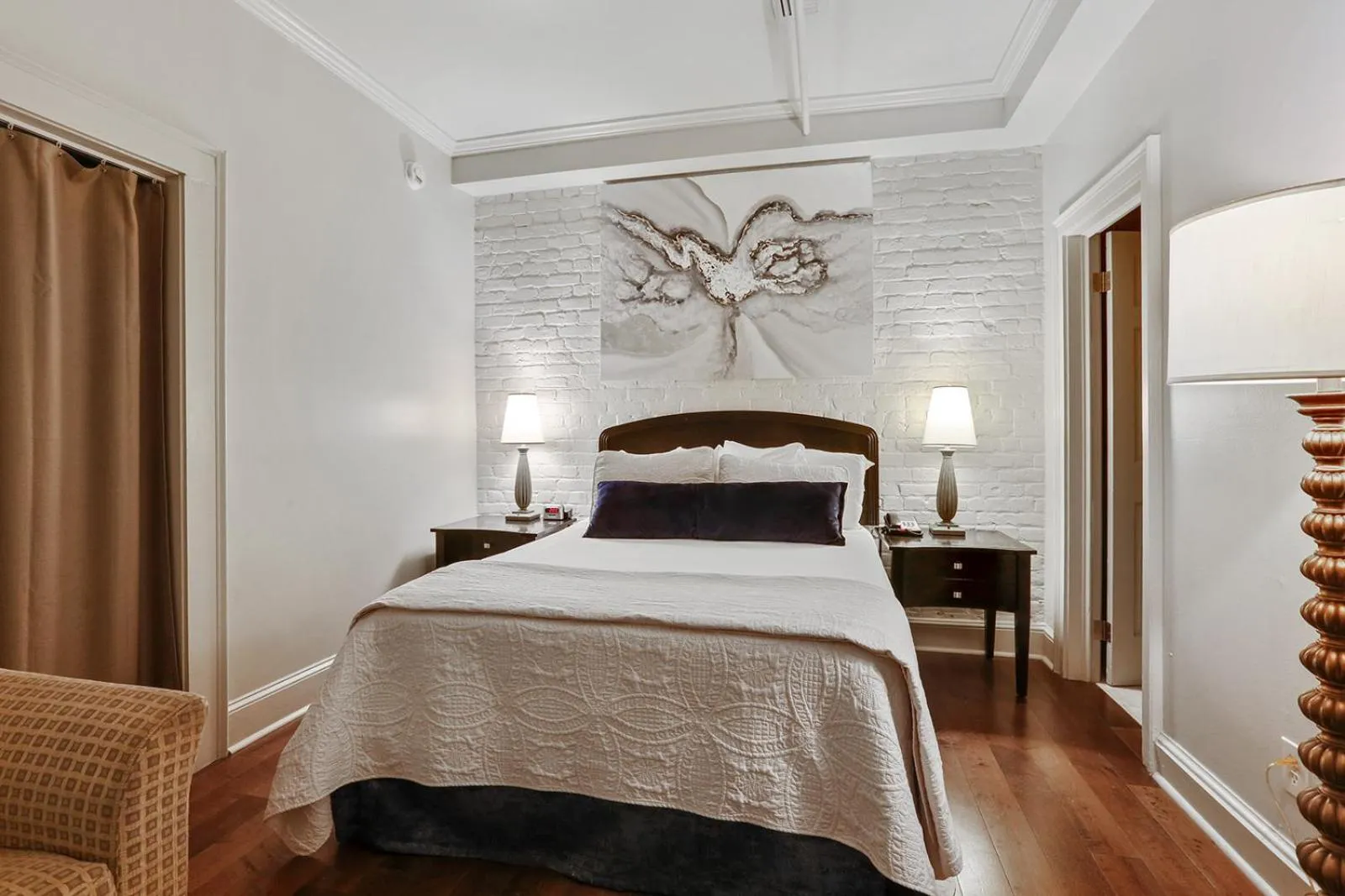 Photo of the whole room, Bed in La Galerie French Quarter Hotel