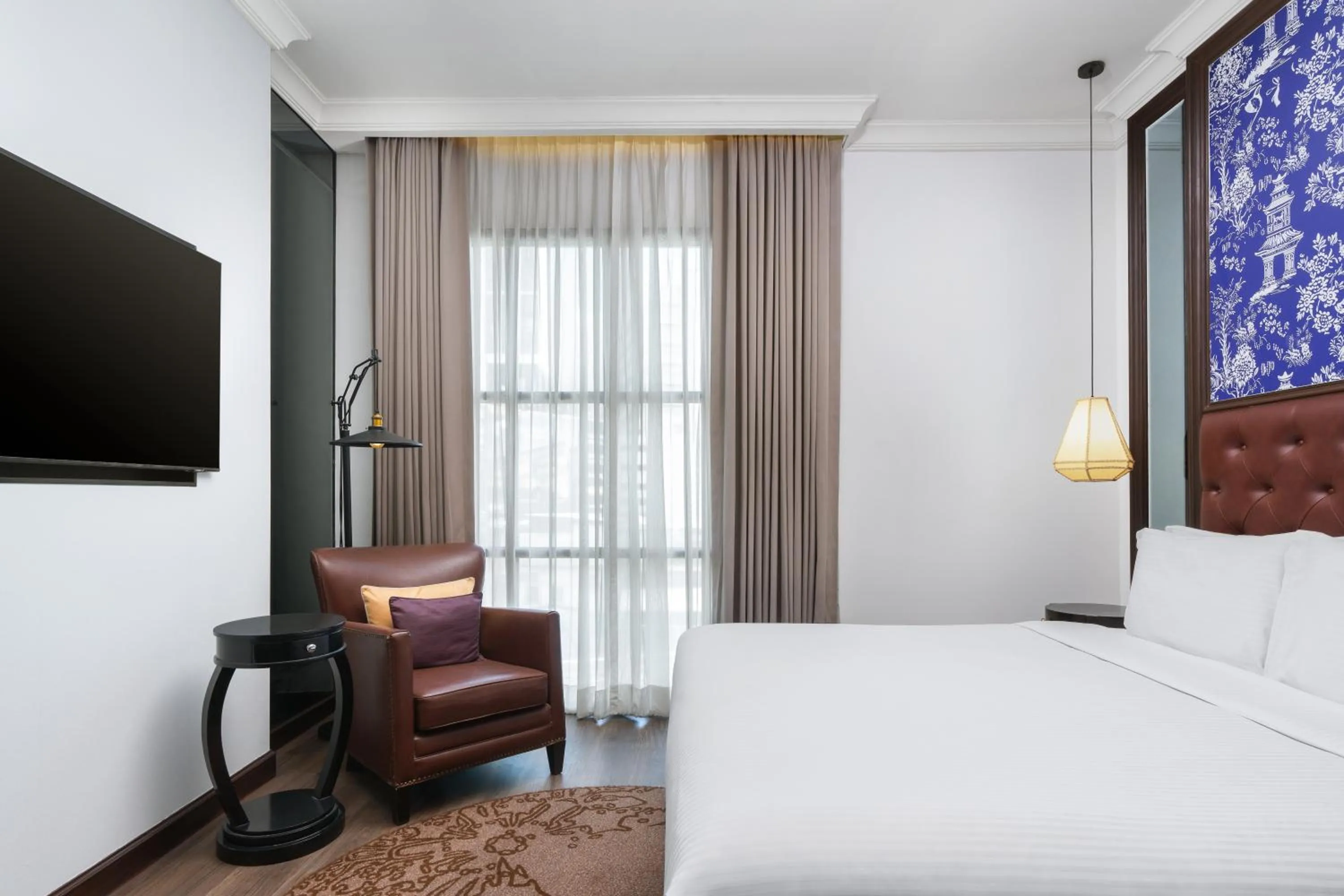 Bed in Metropole, Bangkok, a Tribute Portfolio Hotel