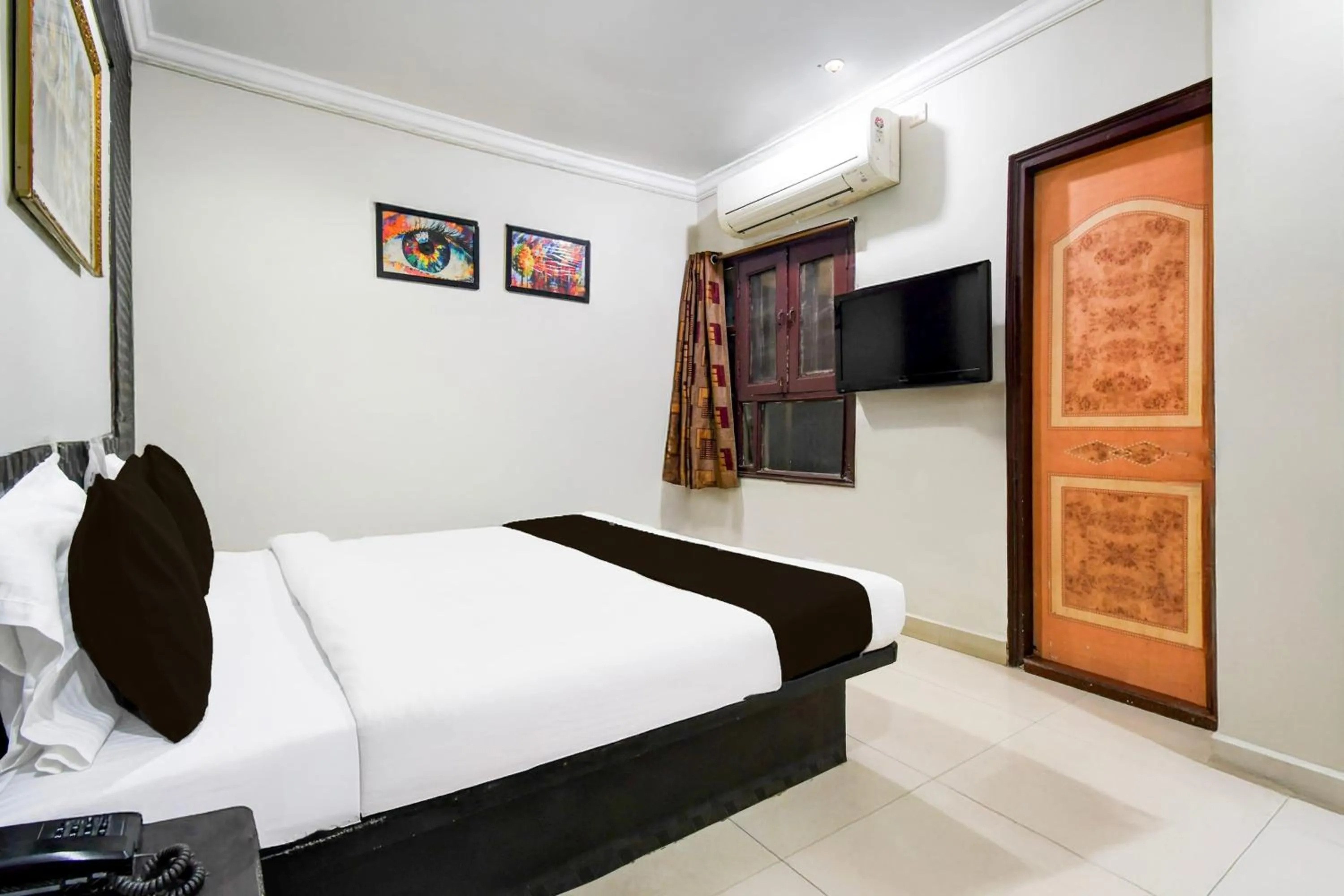 Bedroom in Hotel O Raipur Railway Station Formerly Hotel Okasu