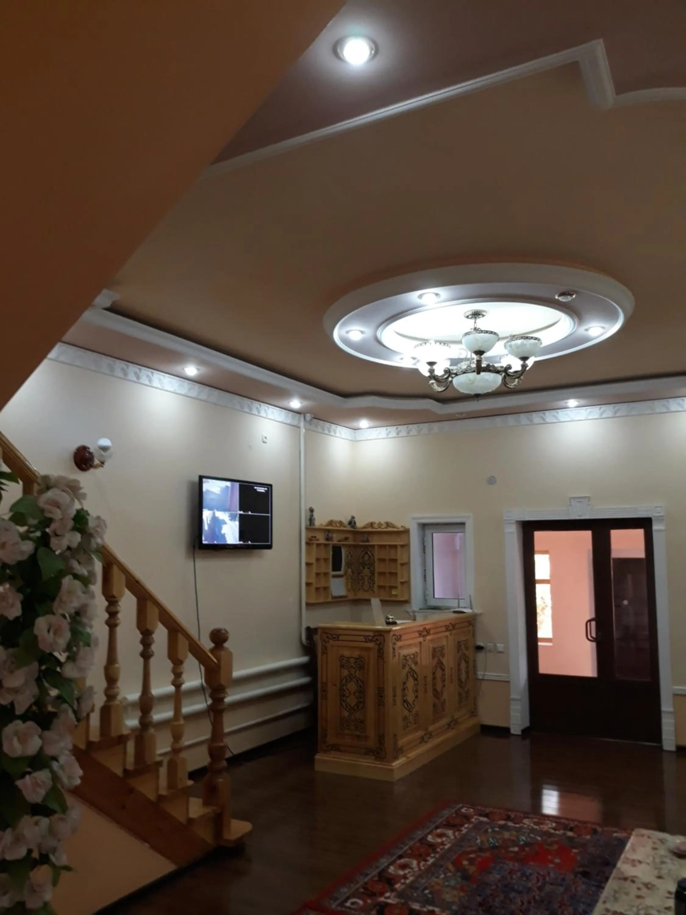 Communal lounge/ TV room in Guest House Orzu