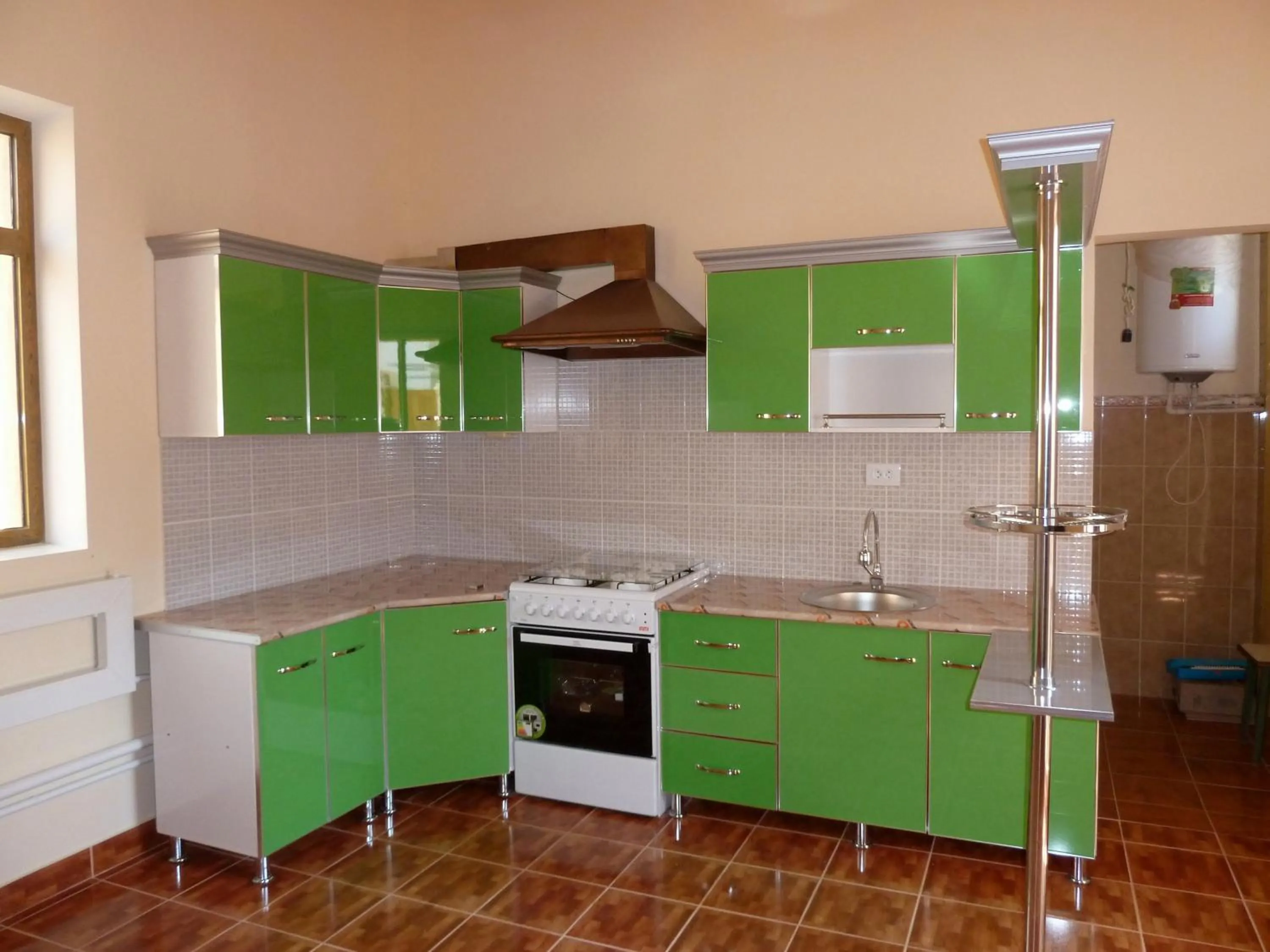 Kitchen or kitchenette in Guest House Orzu