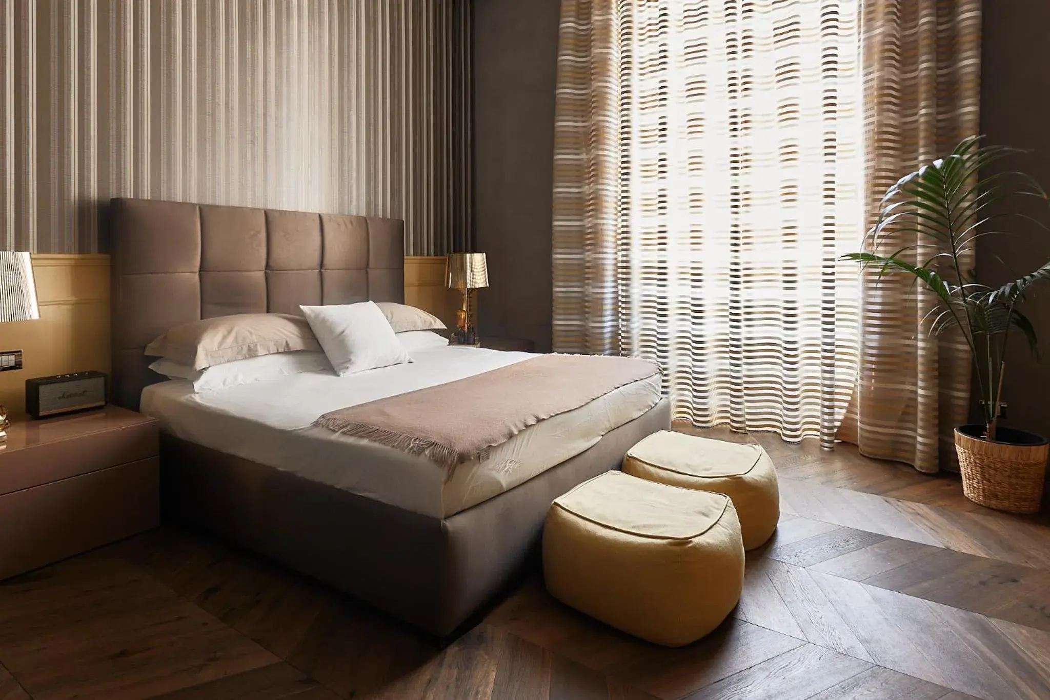 Bed in Le Quattro Dame Luxury Suites Bed in Le Quattro Dame Luxury Suites