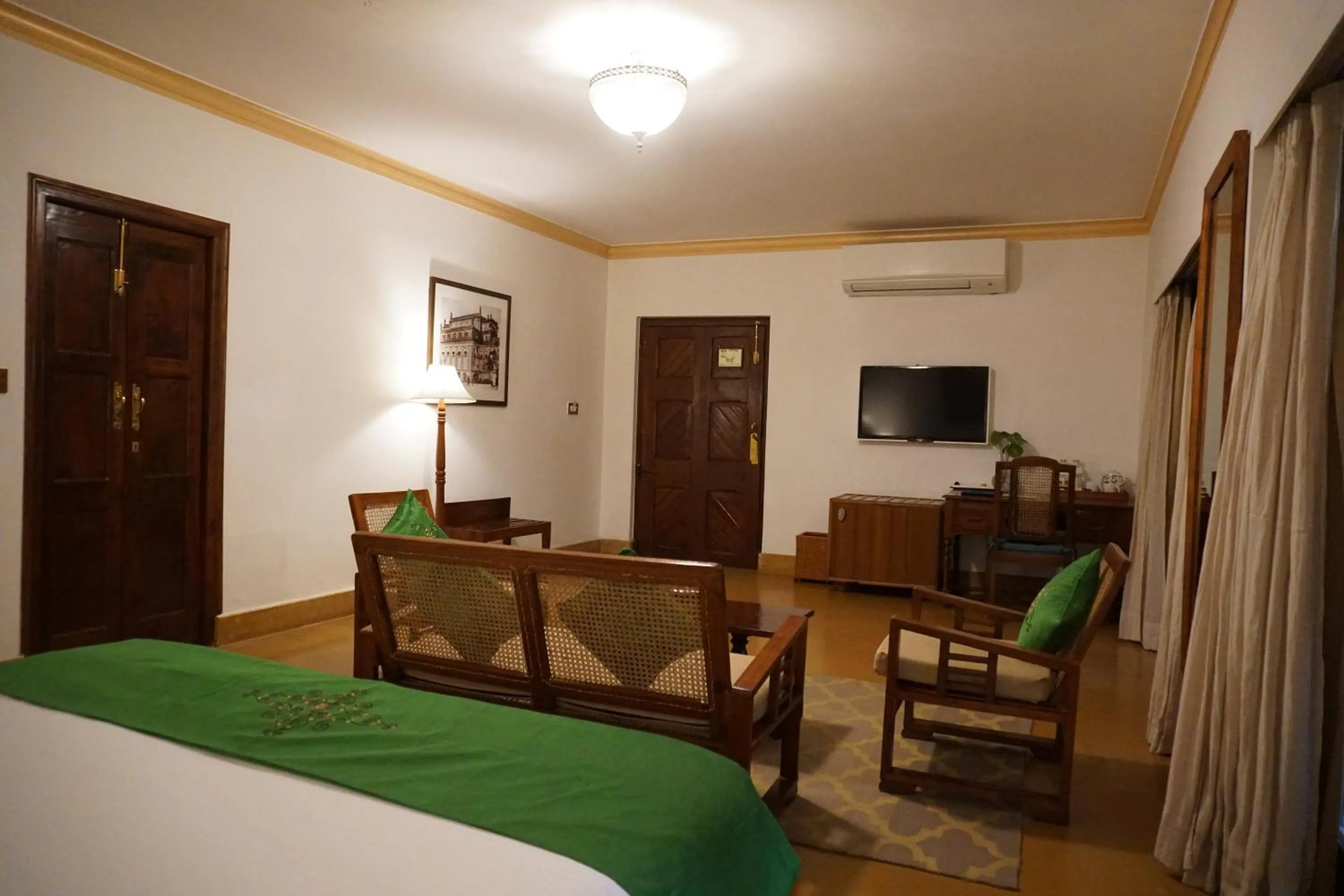 Seating area, Bed in Saraca Hotel Lucknow