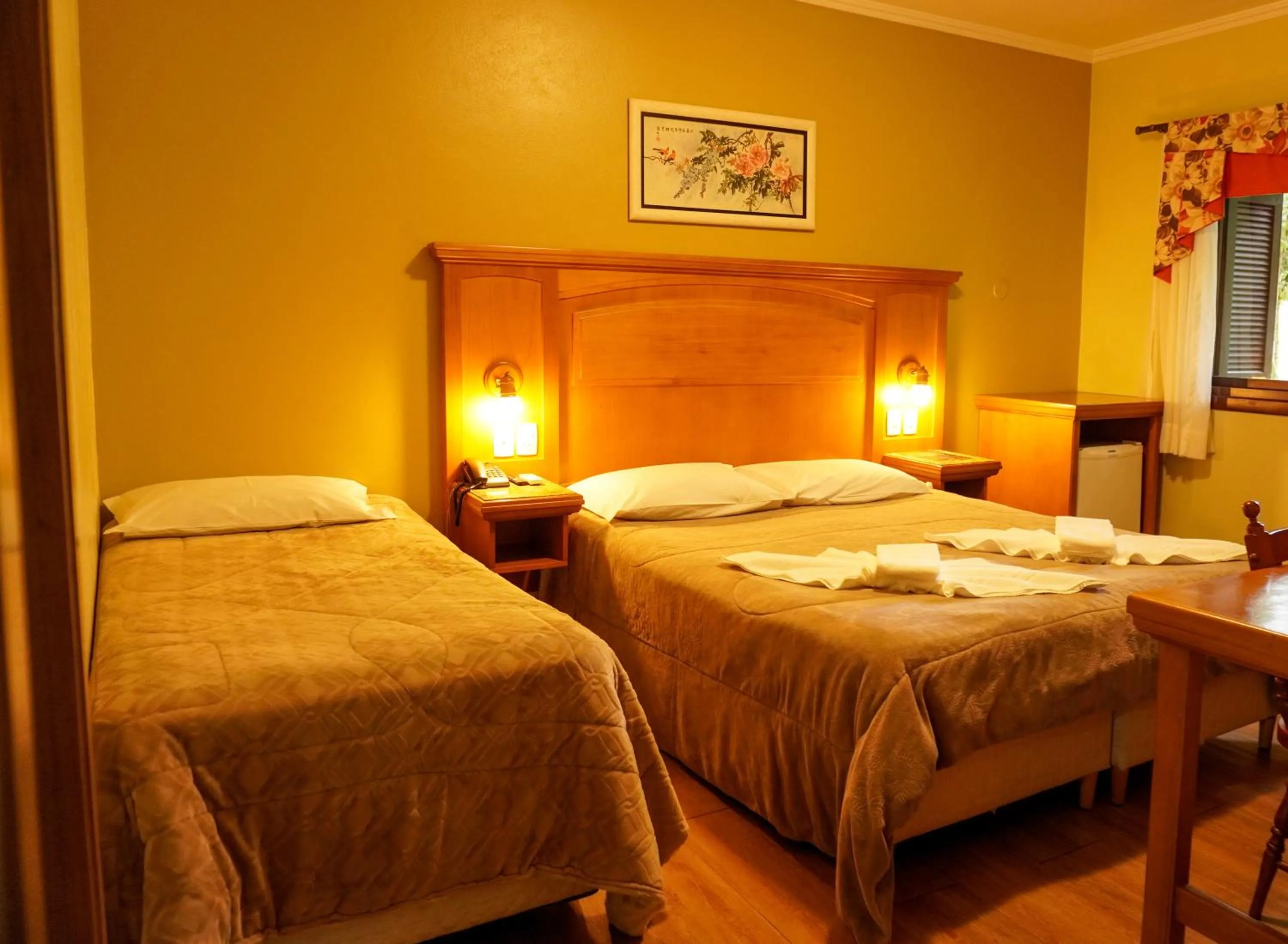 Bed in Pousada Das Papoulas